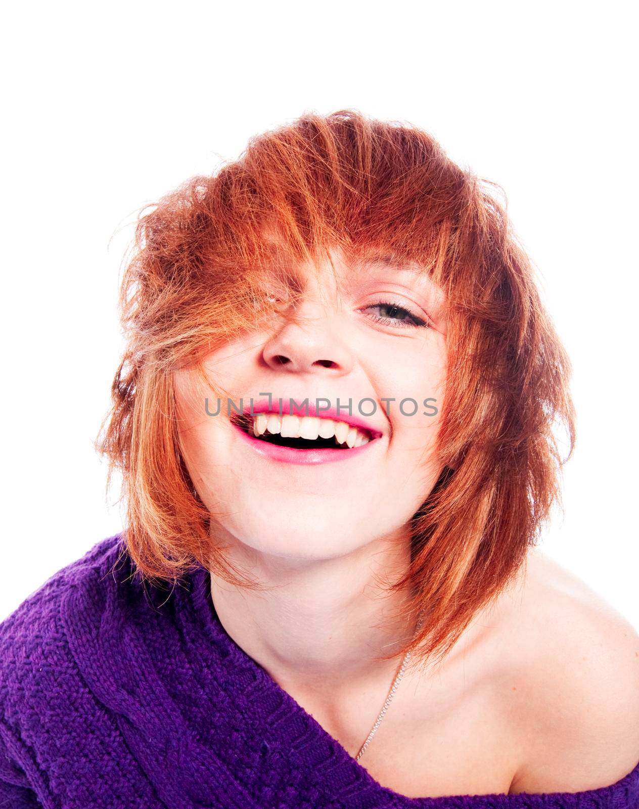 Red-haired girl isolated on white