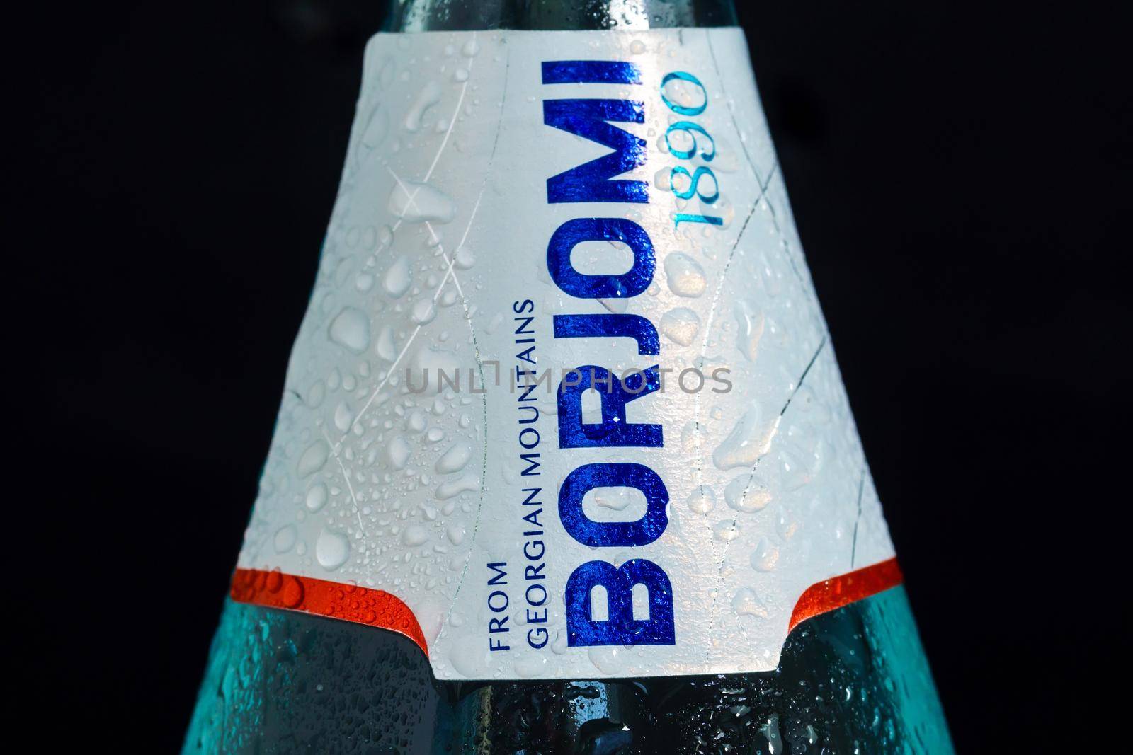Tyumen, Russia-May 25, 2021: Borjomi mineral water in a can from Georgia. Close up logo