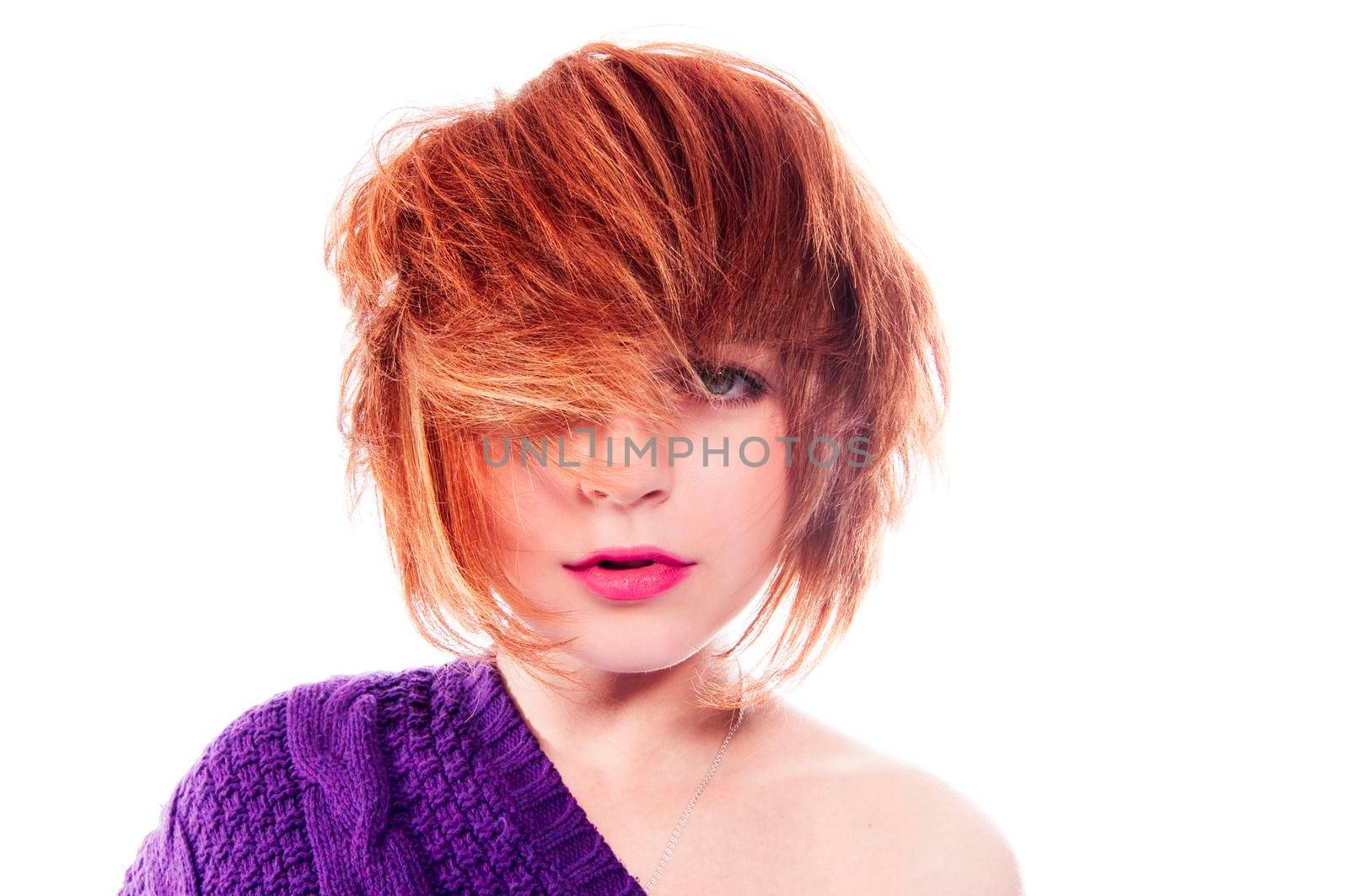 Portrait of a red haired girl isolated on white
