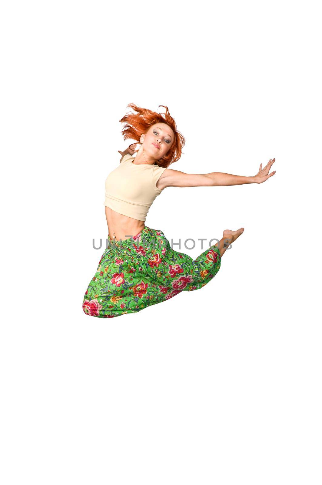 Beautiful girl jumping high isolated on white