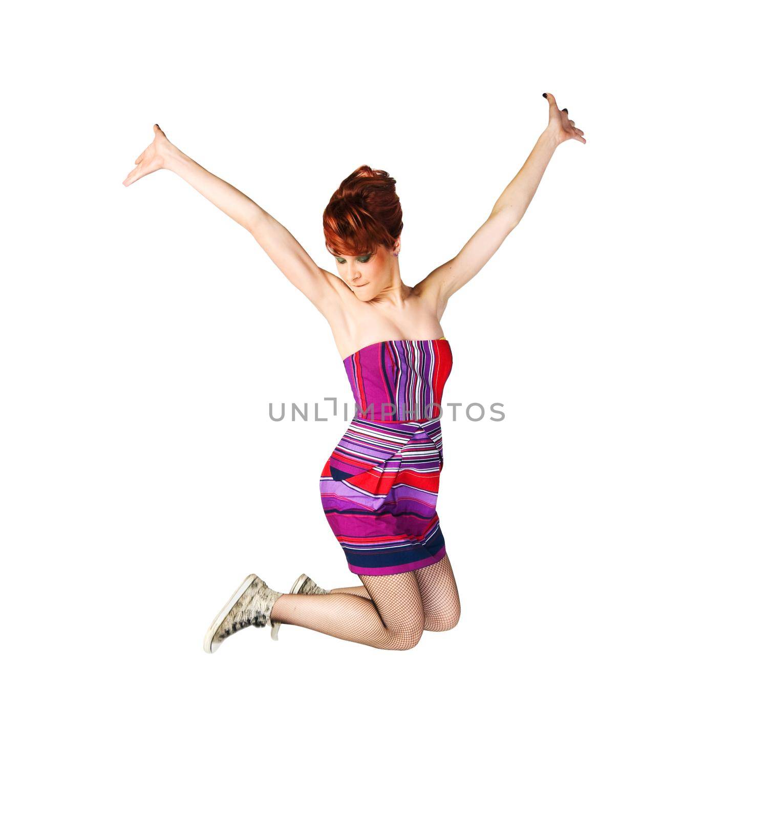 Studio portrait of a beautiful girl on a plain background