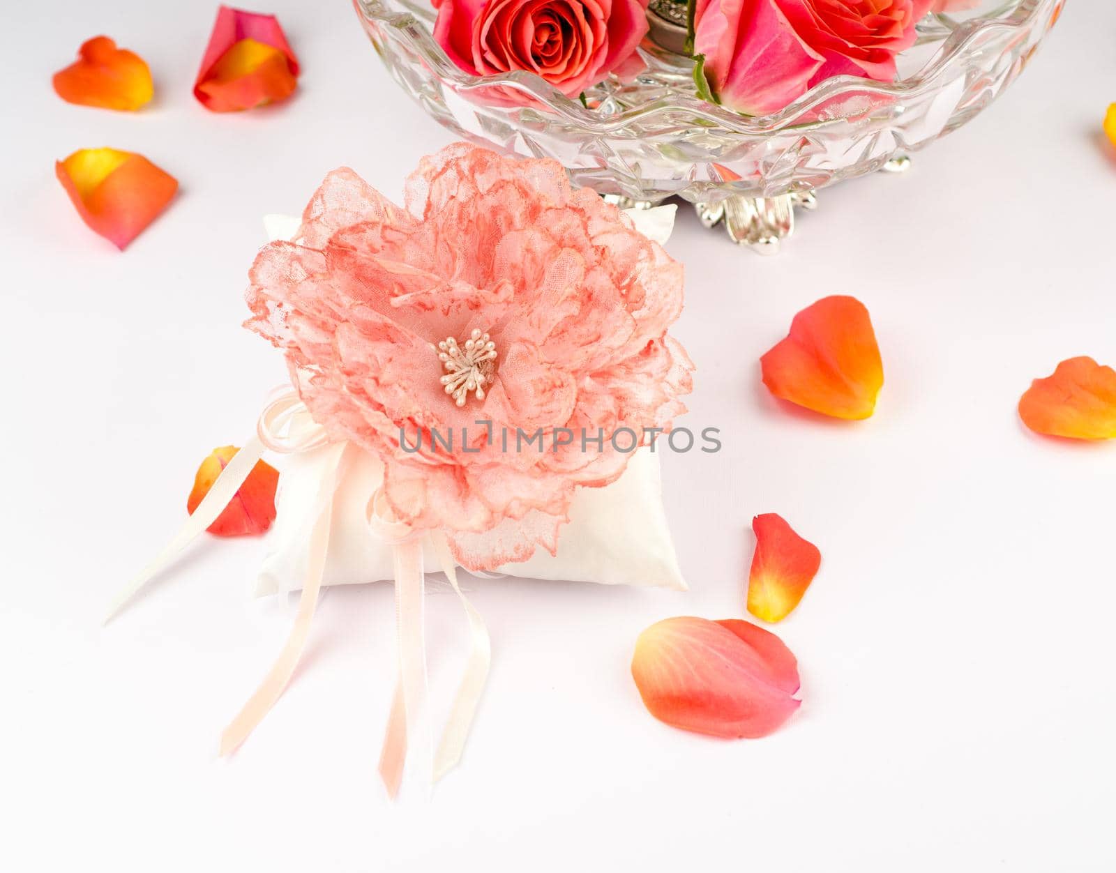 Exquisite pillow for wedding rings on gray background