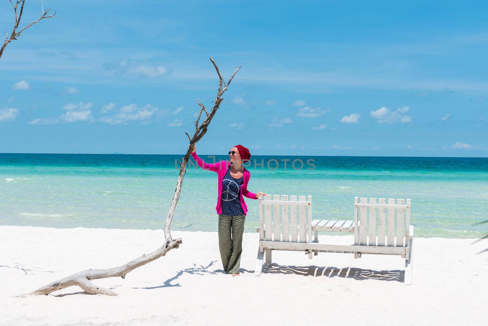 Young woman at beautiful tropical beach with white sand. Bai Sao, Phu Quoc, Vietnam