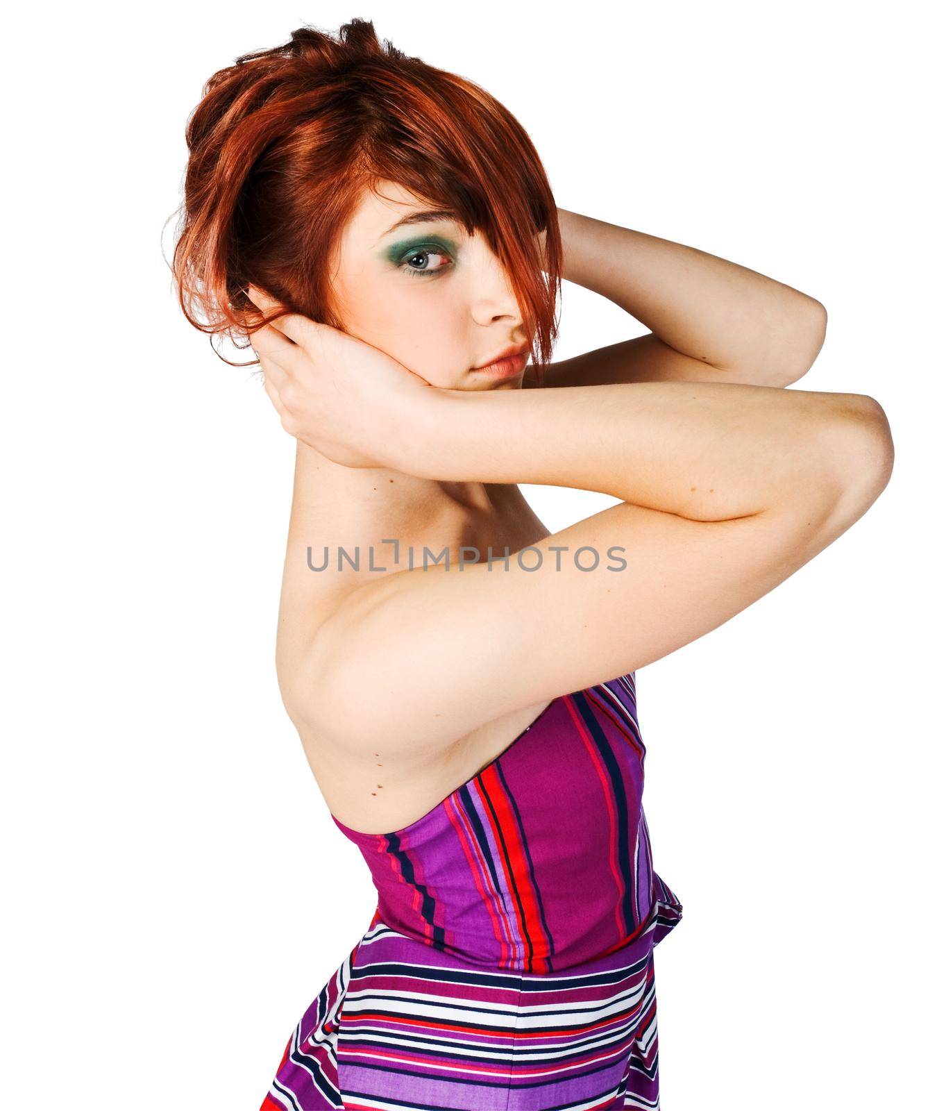 Beautiful girl posing on white background at the studio