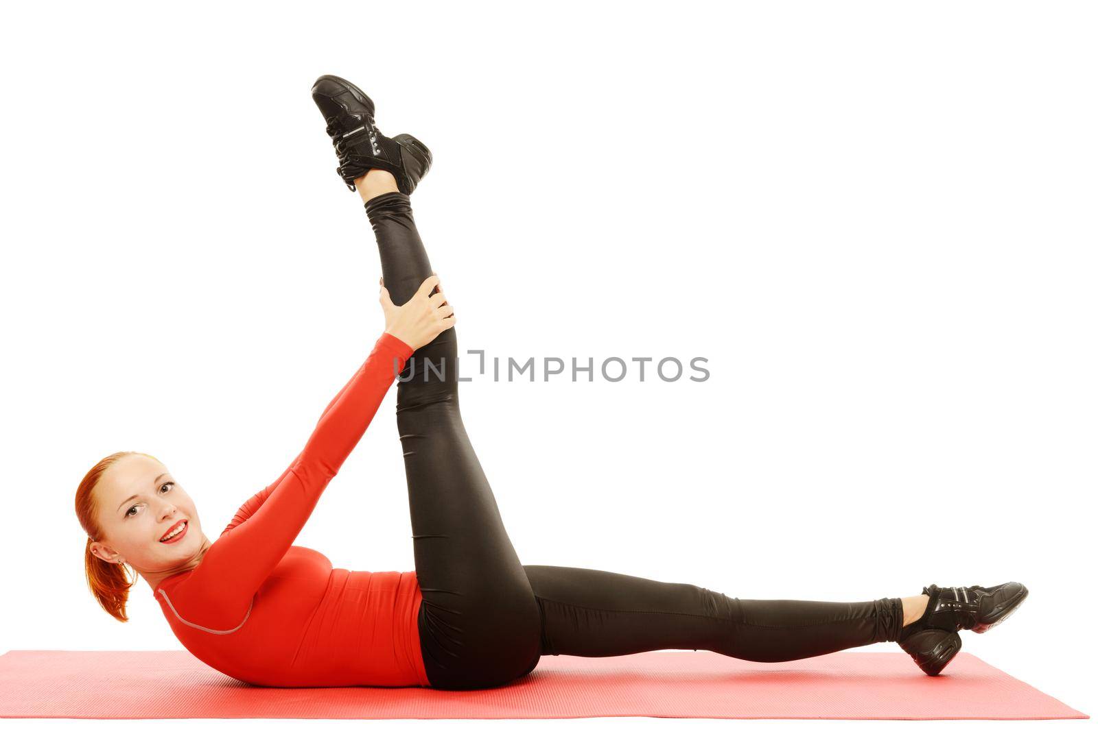 Beautiful slim red fit woman over white background