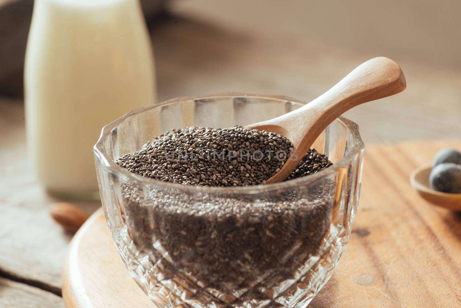 Chia seeds on white background. Chia seeds also known as superfood and used in a wide spectrum of diets. by makidotvn