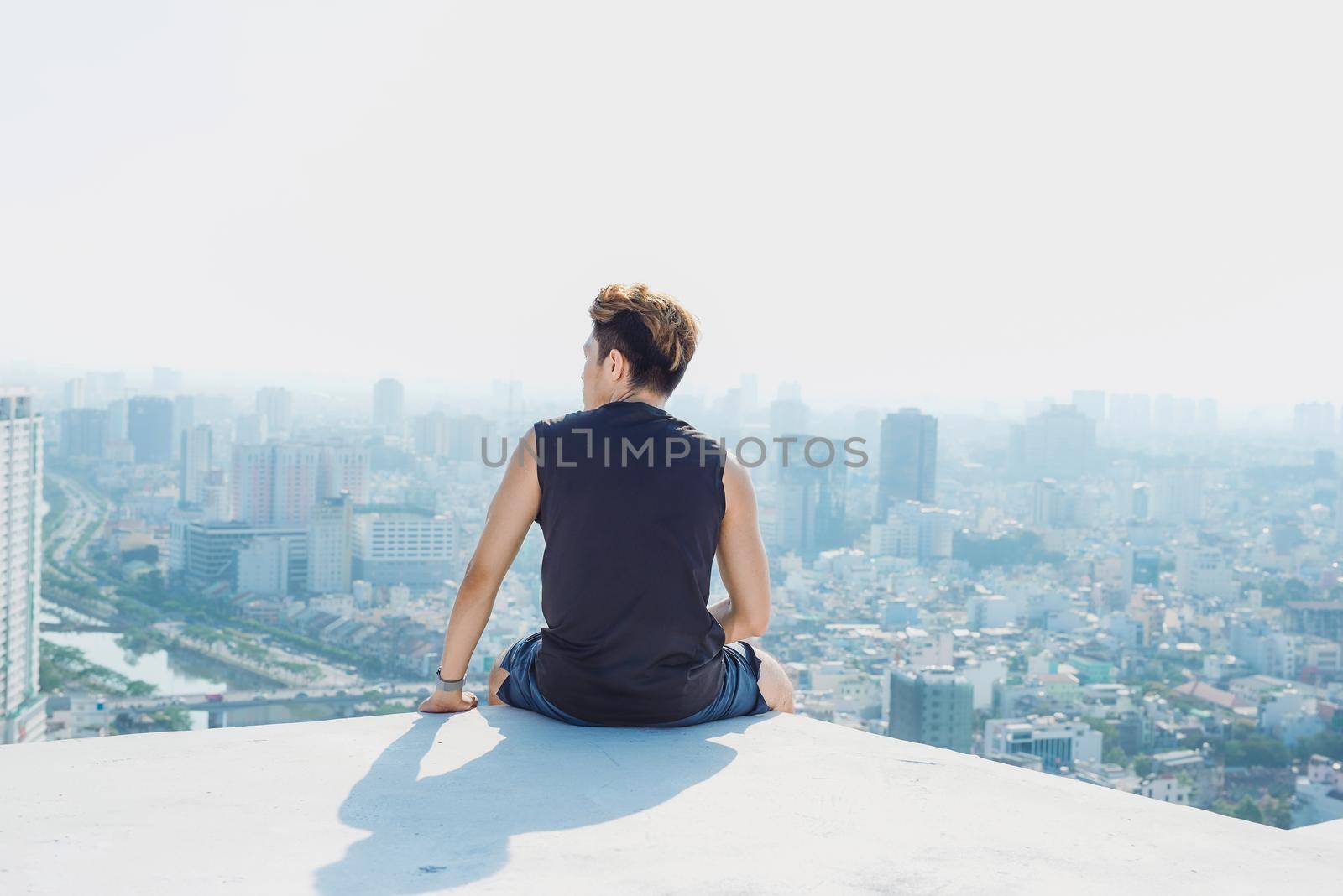 Man Sitting Rest Rooftop Concept