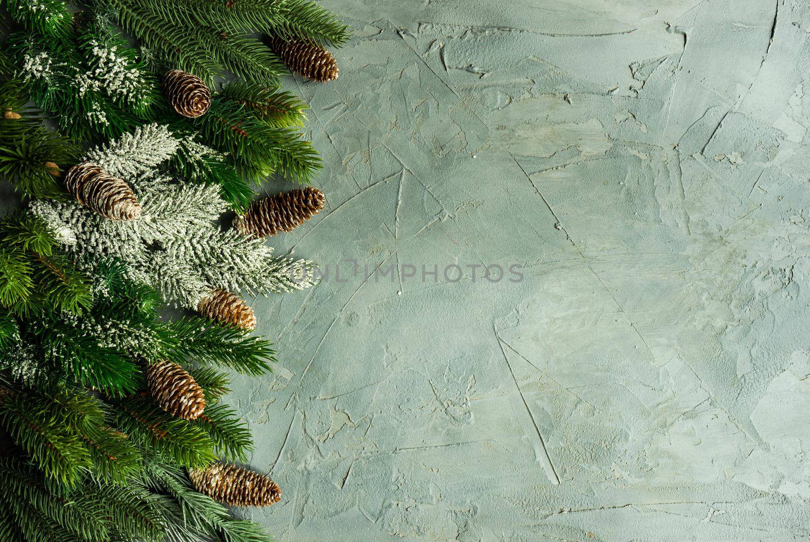 Minimalistic Christmas card concept on concrete background with copy space