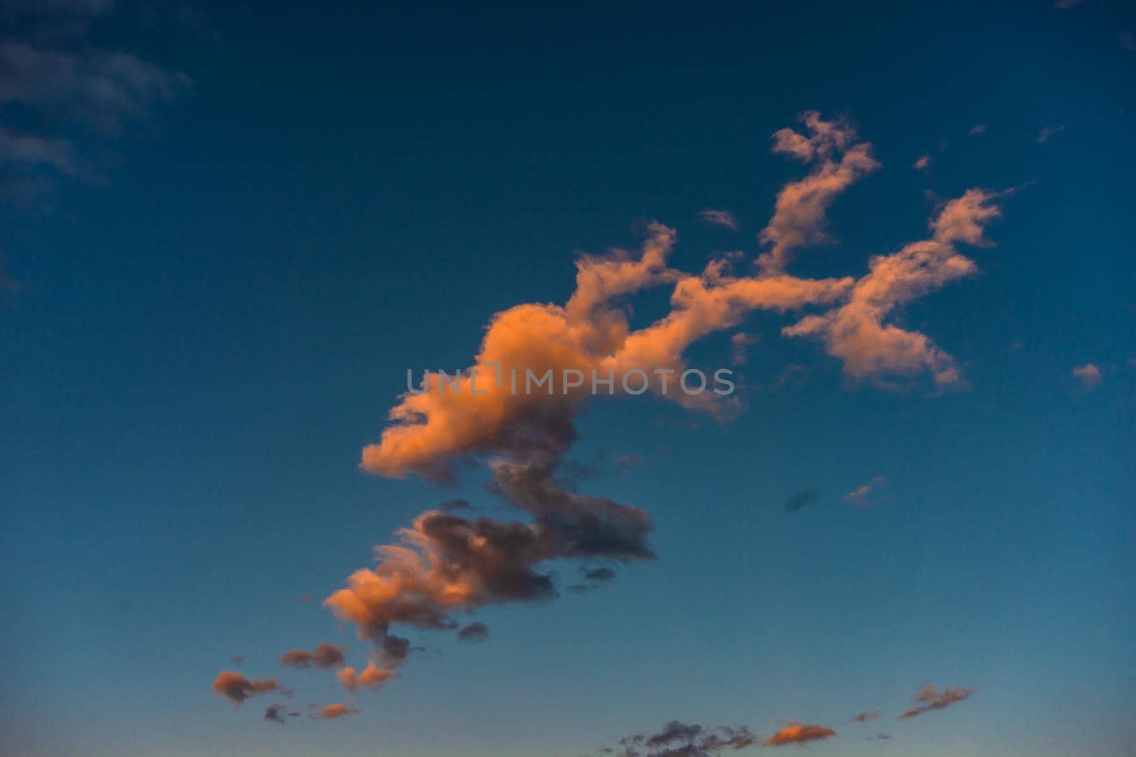 Sunset sky with clouds as a natural background