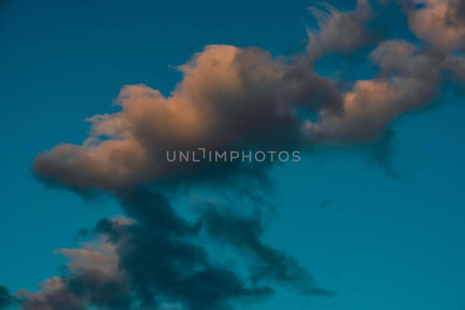 Sunset sky with clouds as a natural background