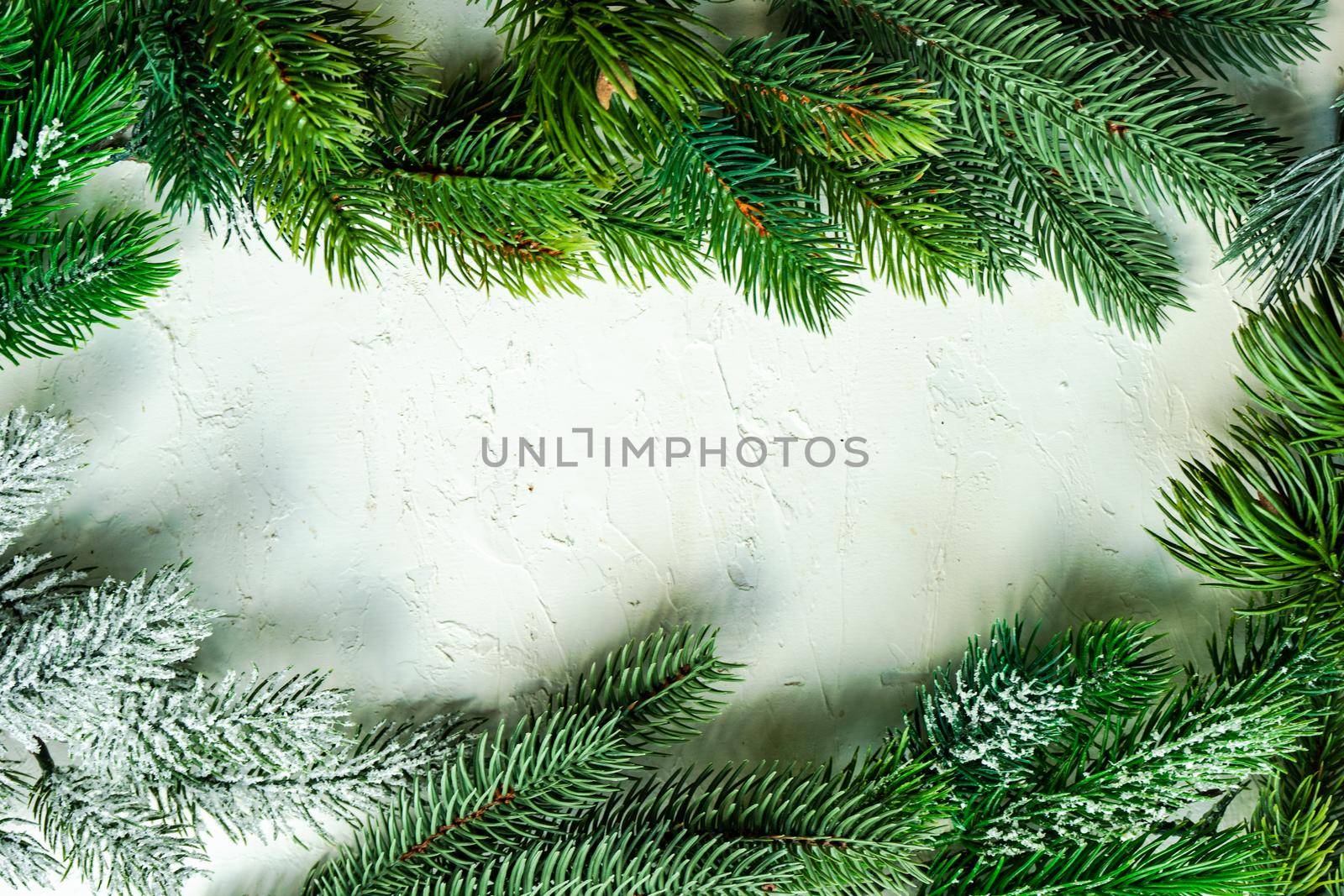 Minimalistic Christmas card concept on concrete background with copy space