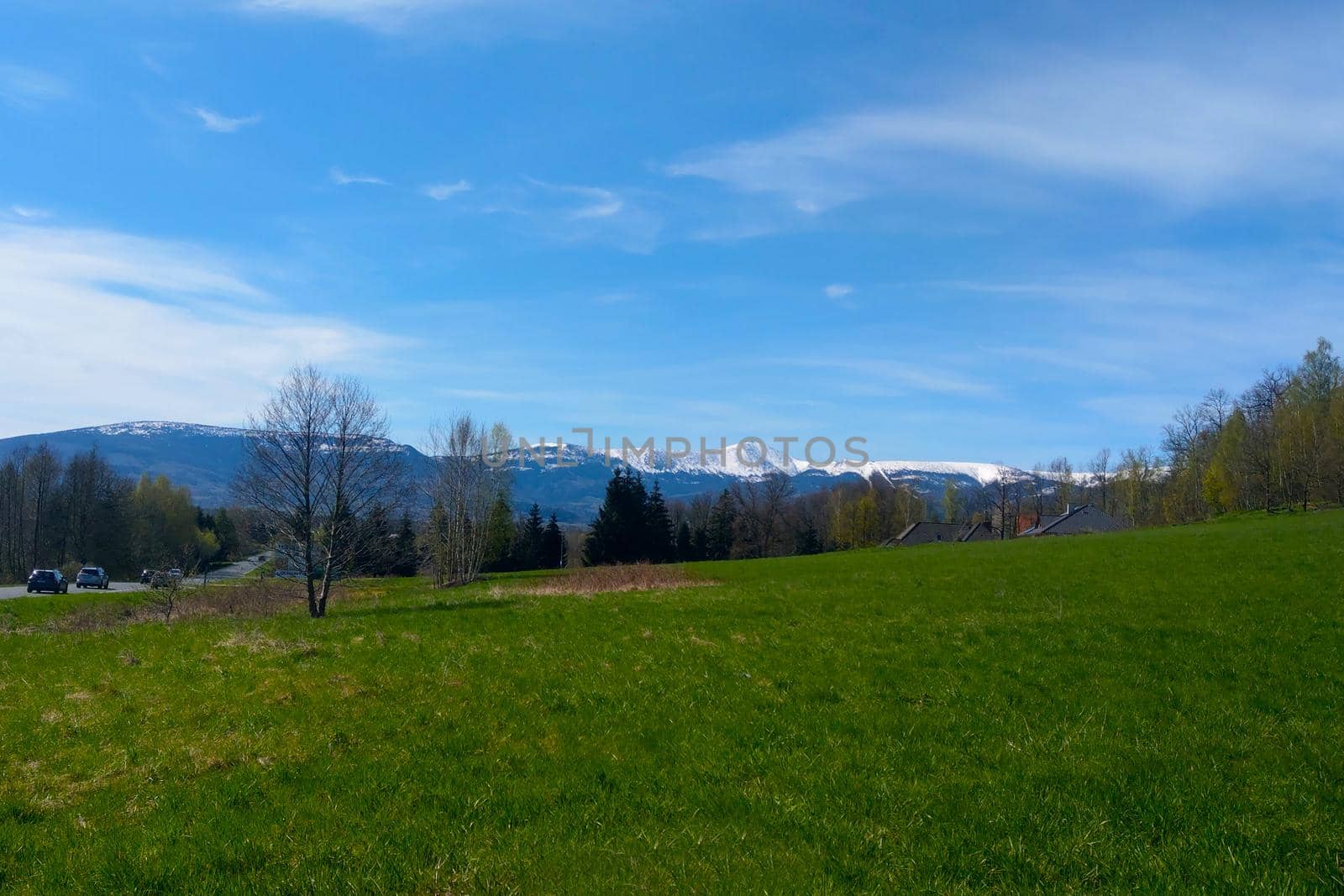 Beautiful view of the snow-capped mountain peaks in summer