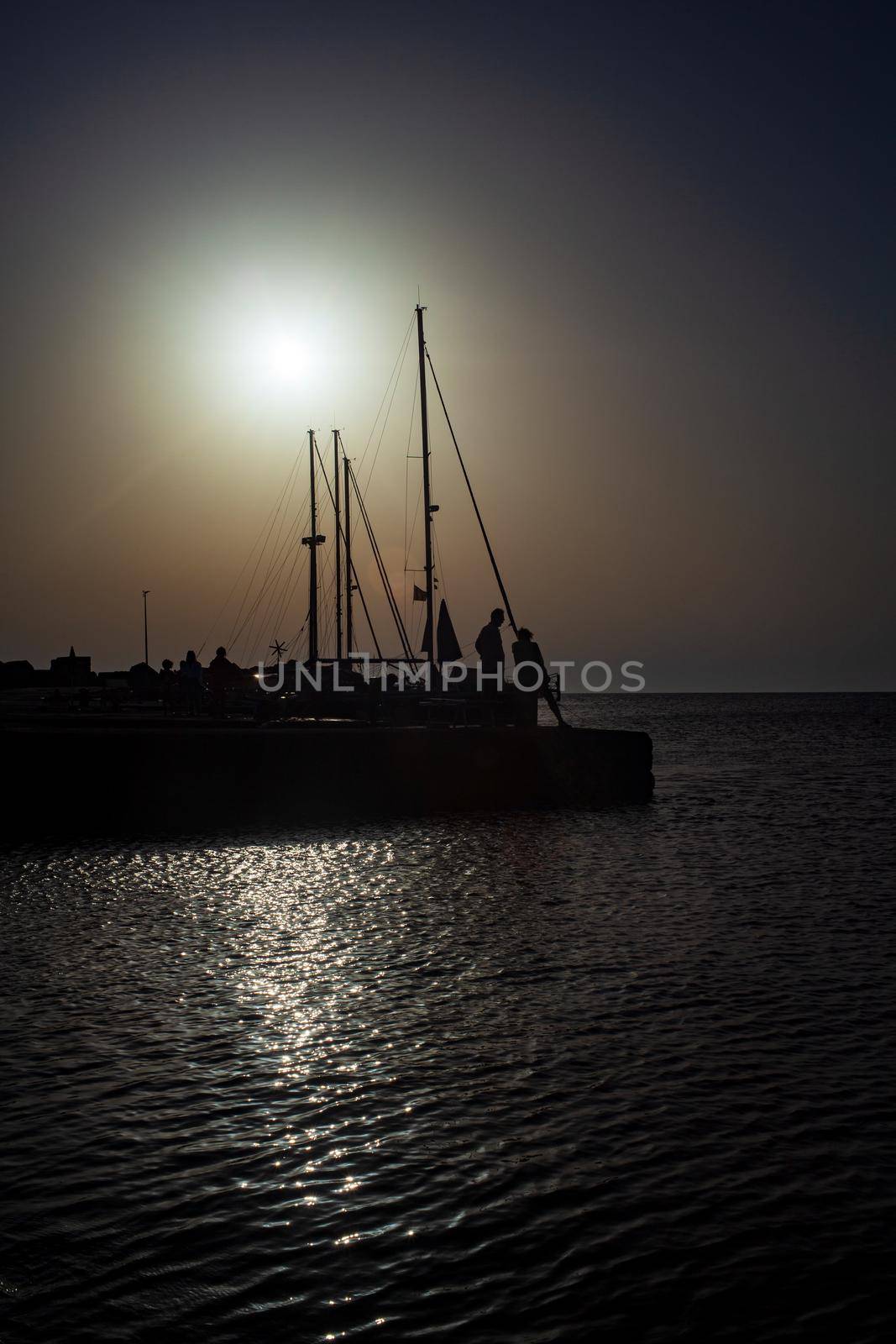 View of the pier of Linosa at sunset, Sicily