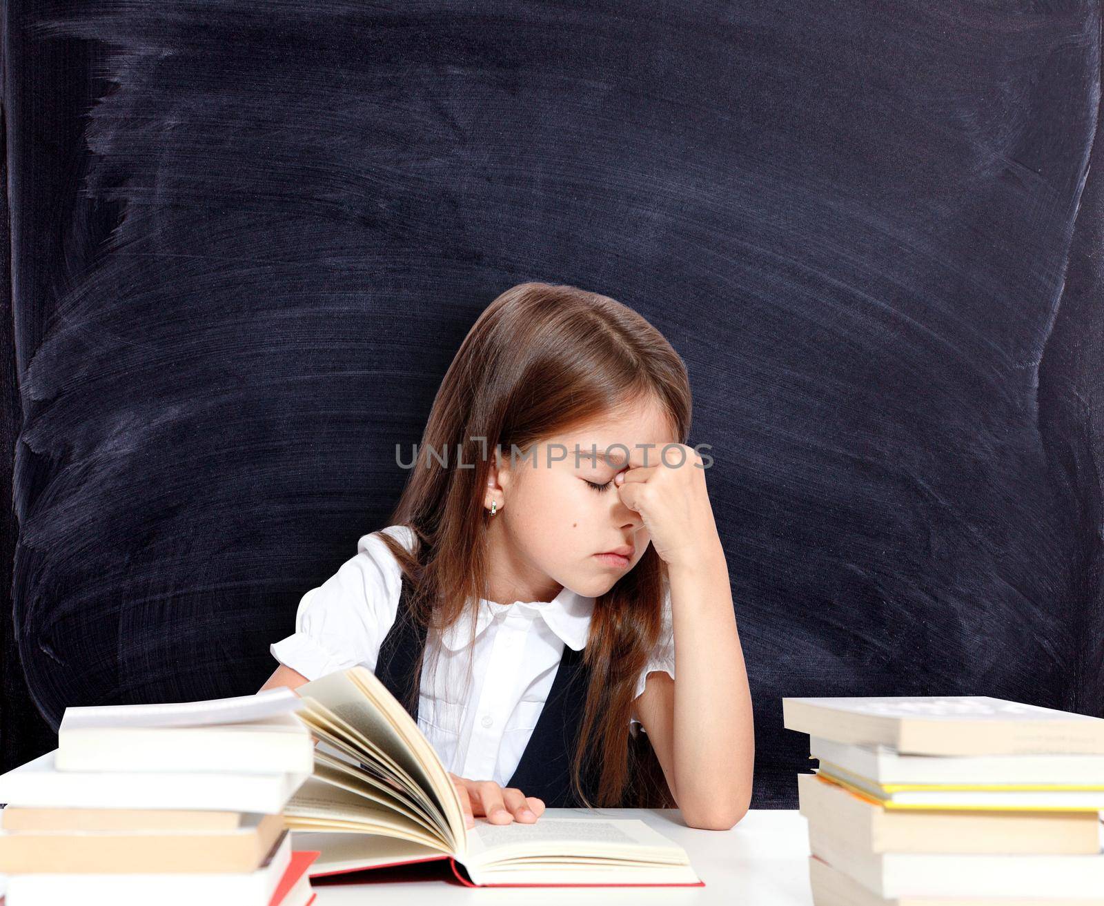 Frustrated and unhappy teen girl at school. by Taut