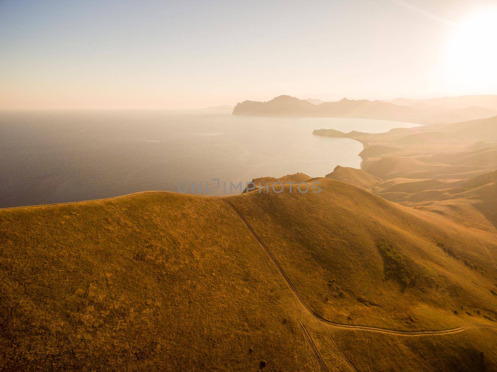 Late summer sunset aerial landscape in Crimea mountains near Black Sea