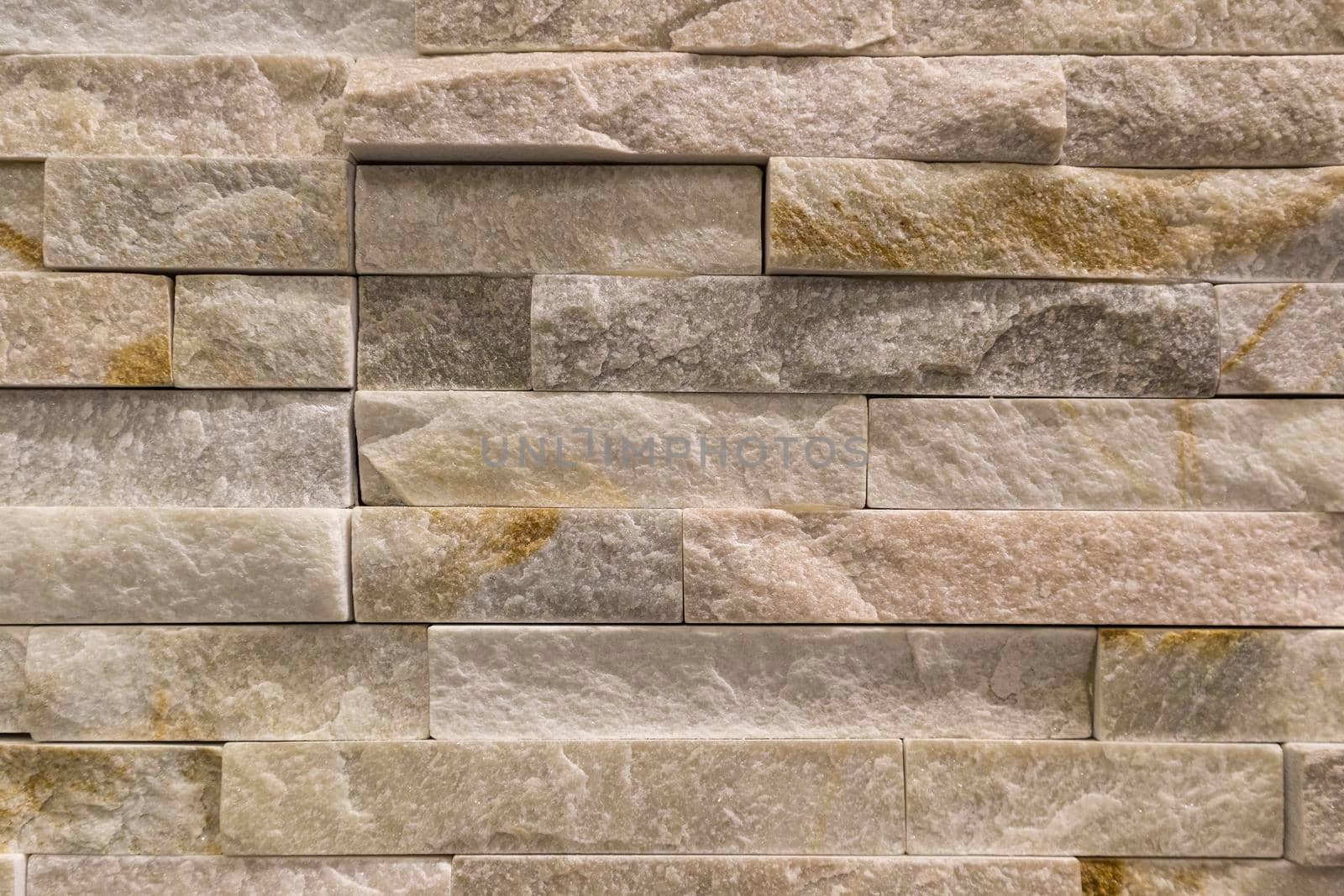 masonry wall paving stones as a background close up. High quality photo