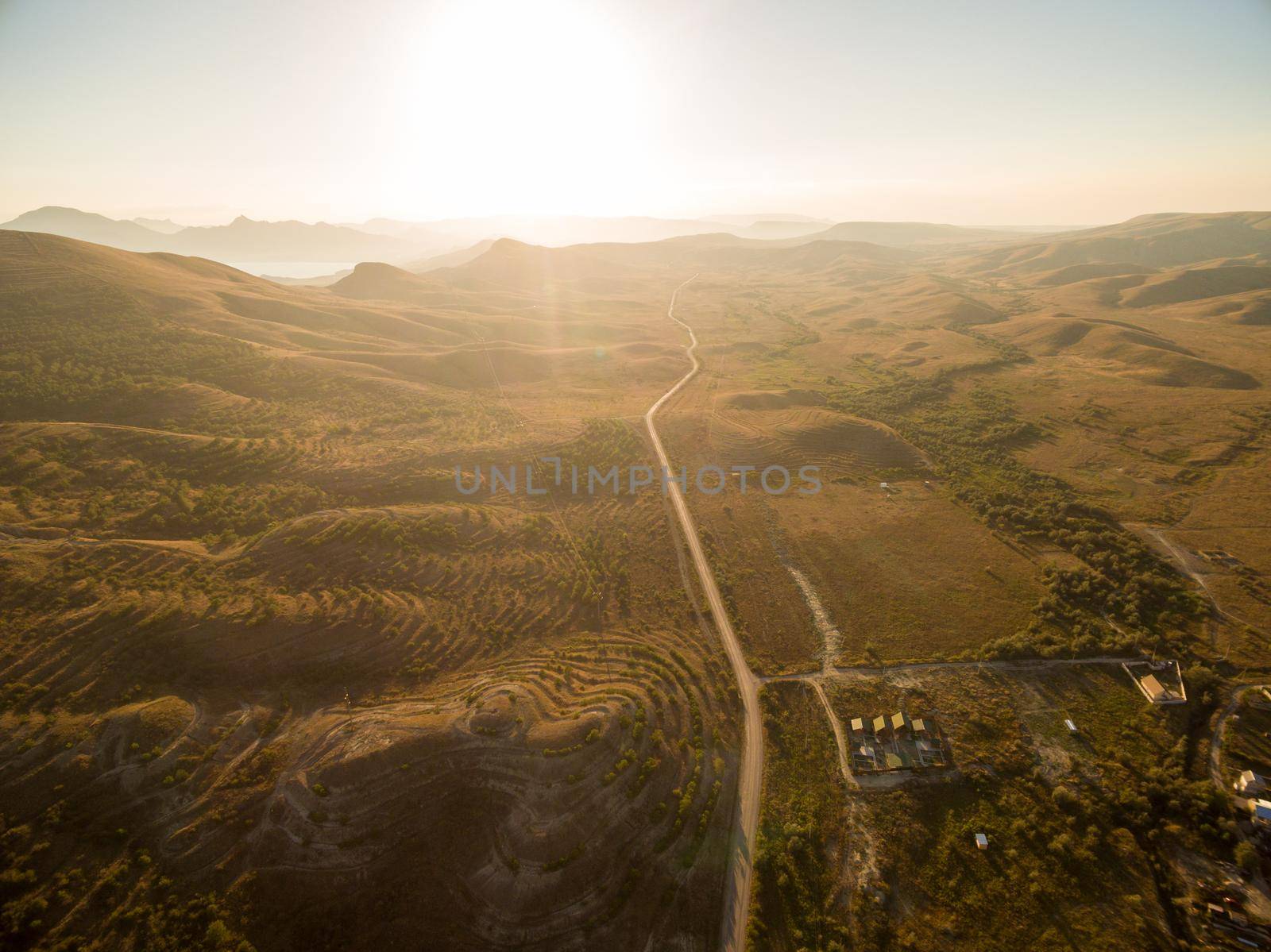 Late summer sunset aerial landscape in Crimea mountains near Black Sea