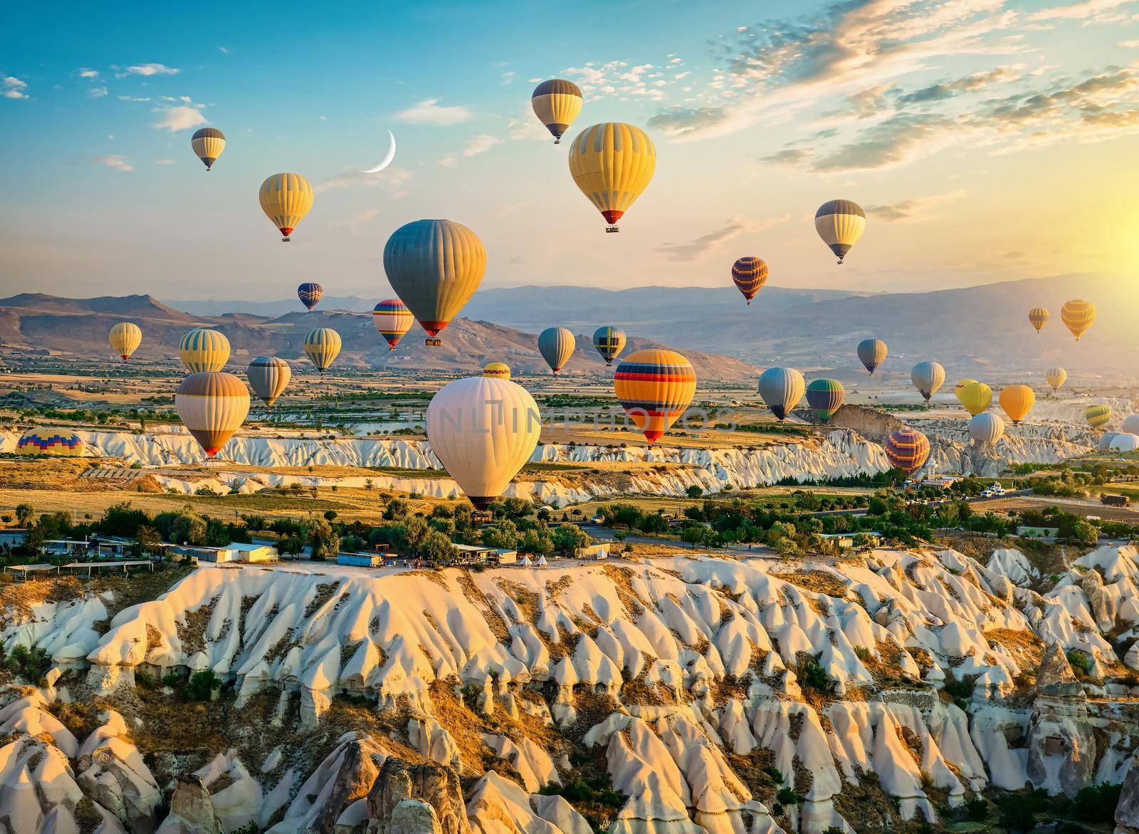 Air balloons flying over Cappadocia by Givaga