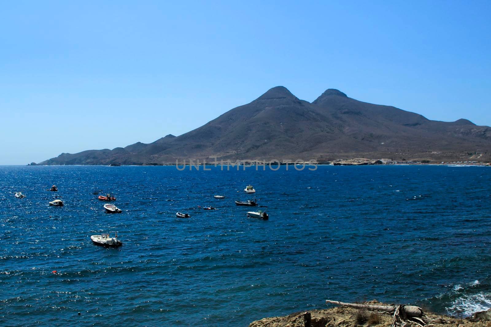 Beautiful seascape in Isleta del Moro village. Volcanous in the background.