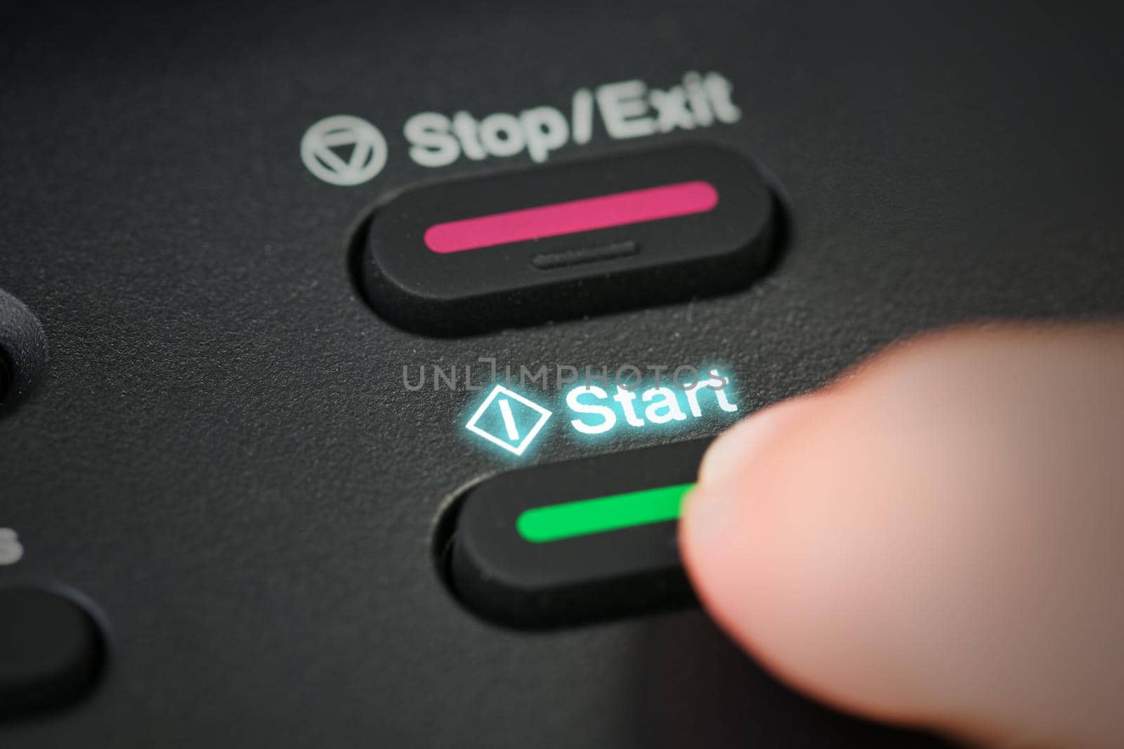 Close-up hand button start mission.