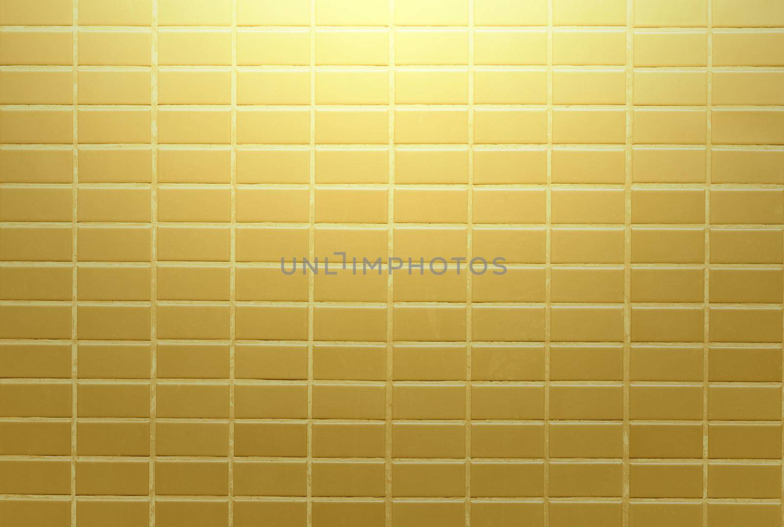 Gold wall blick bright on background texture. by jayzynism