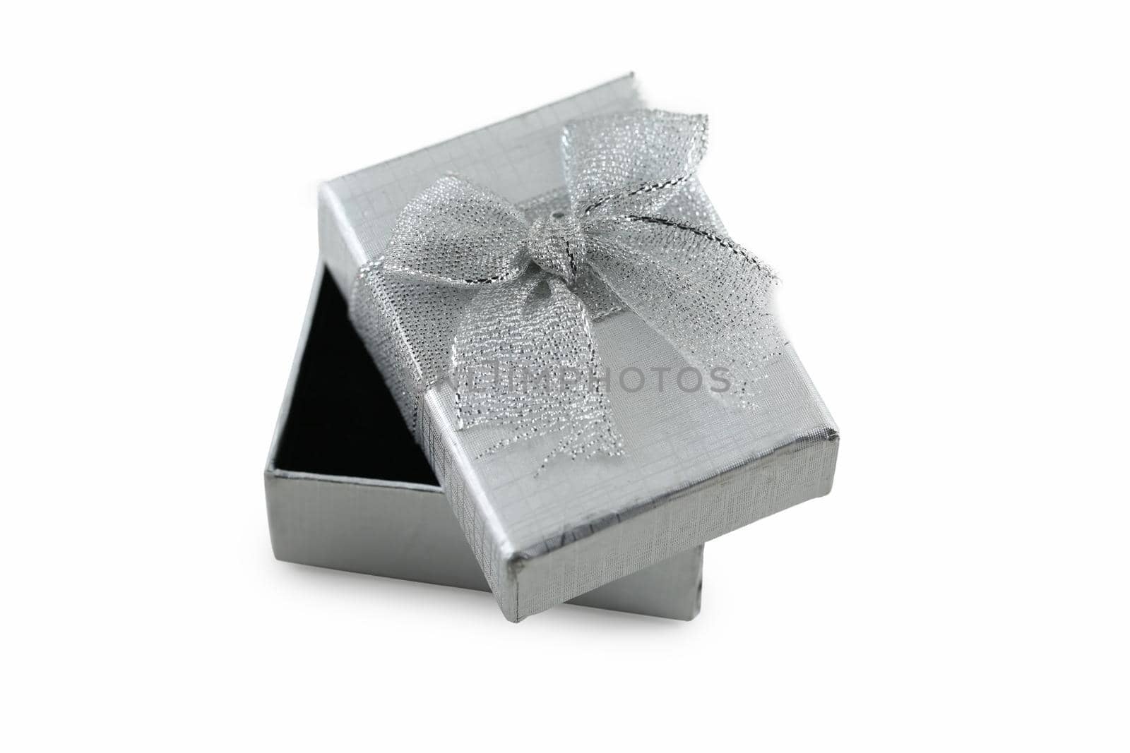 Silver gift box isolated on white background. by jayzynism