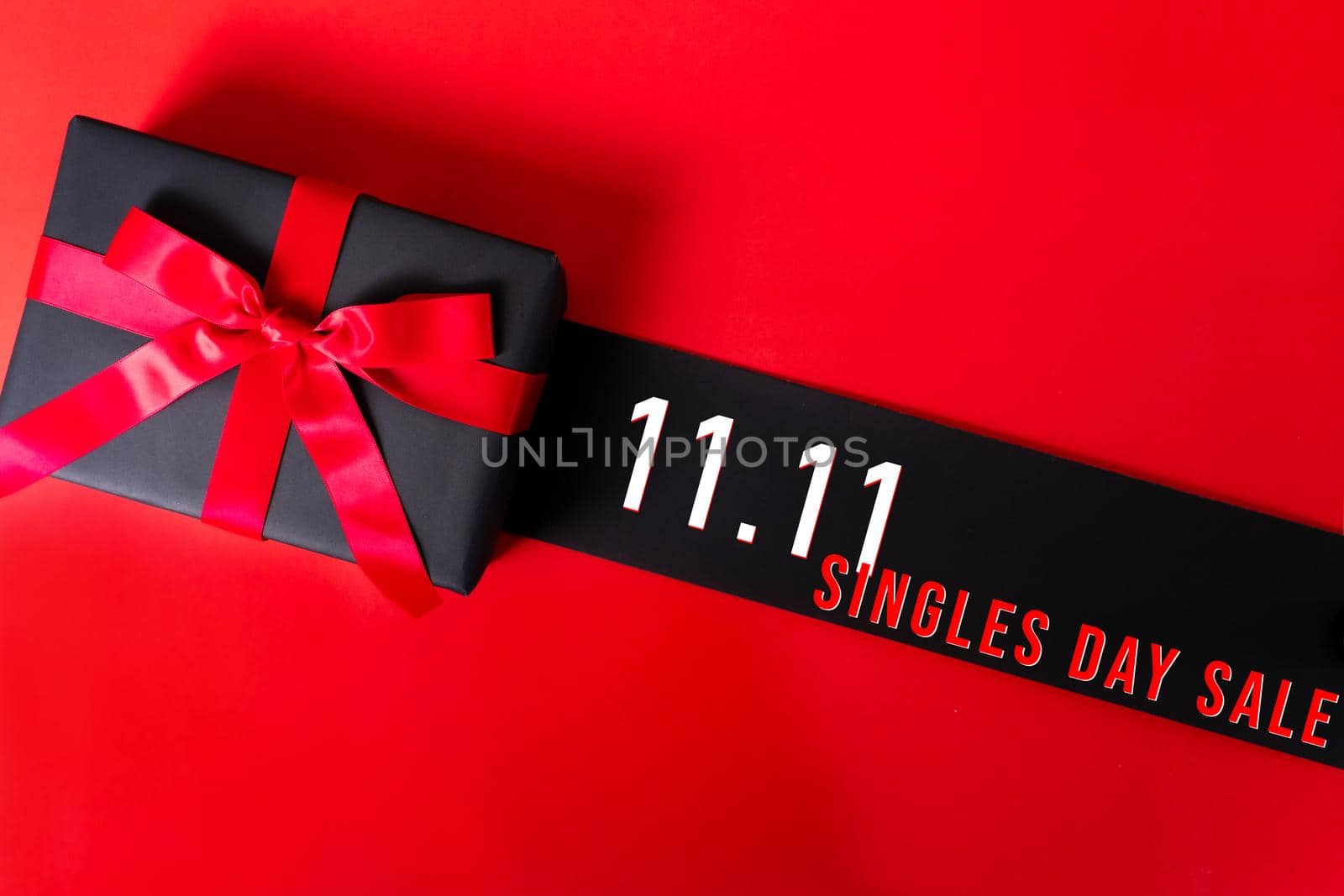11.11 single day sale concept, black gift box for online shopping by psodaz