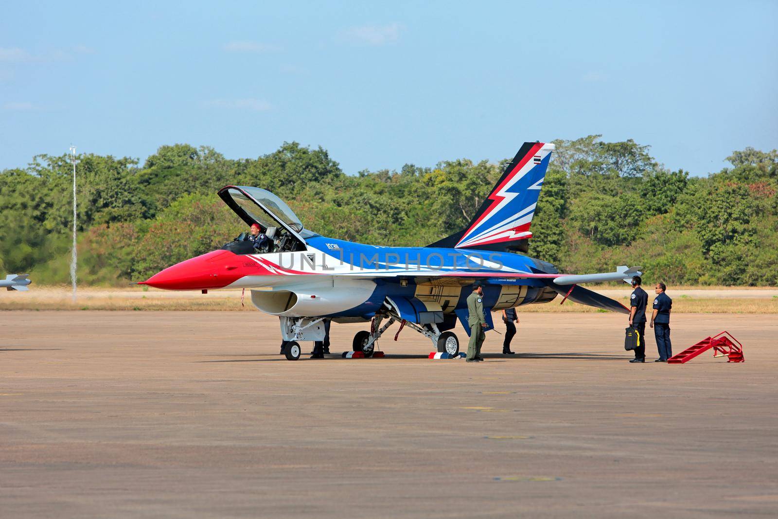 Nakhonratchasima, THAILAND November 27, 2015 : F16 Gripen and August 1st Aerobatic team" engaged in acrobatics. by jayzynism