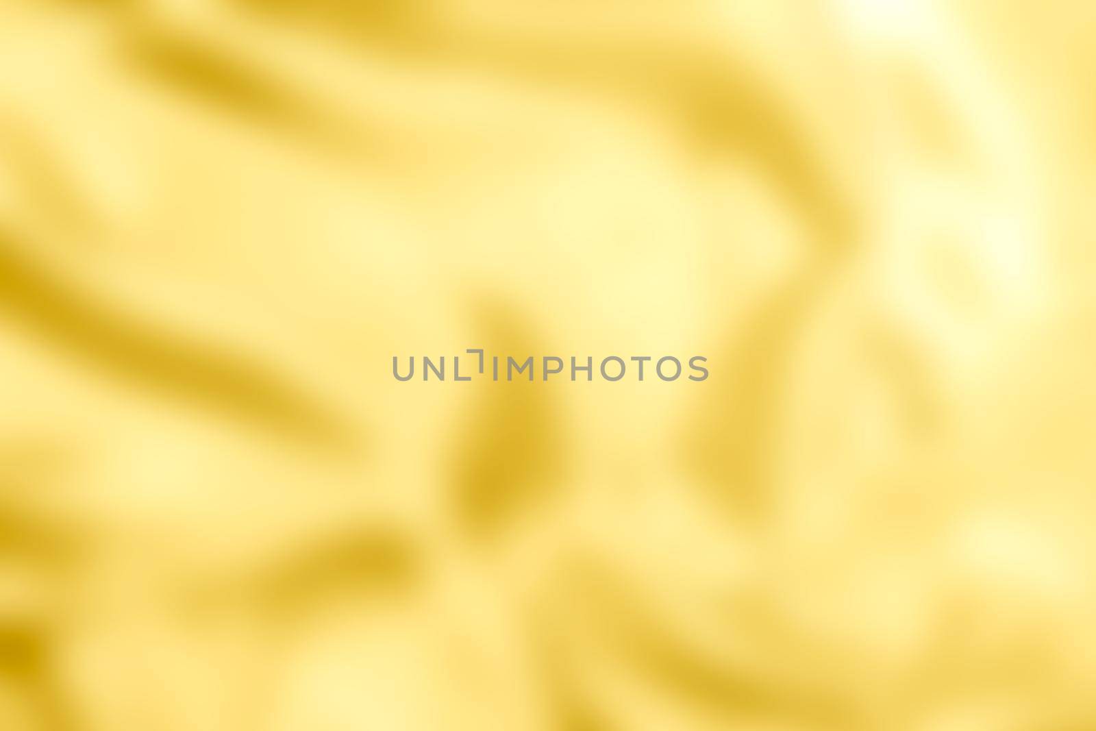 Gold blurry abstract background texture. by jayzynism