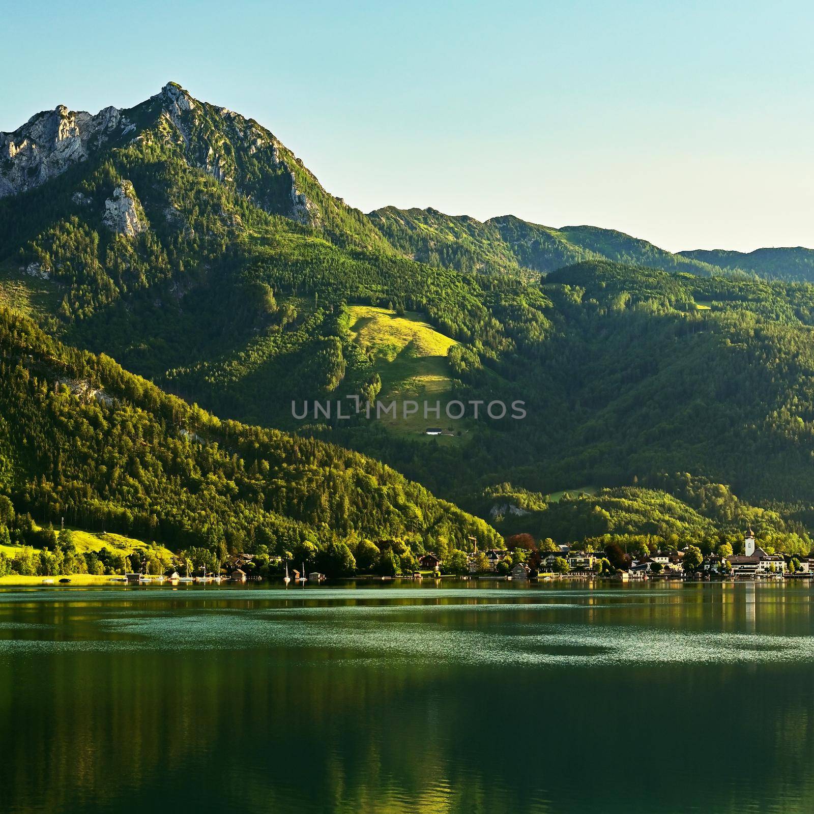 Wolfgangsee lake in summer. Beautiful Austrian landscape with lake and mountains in the Alps. by Montypeter