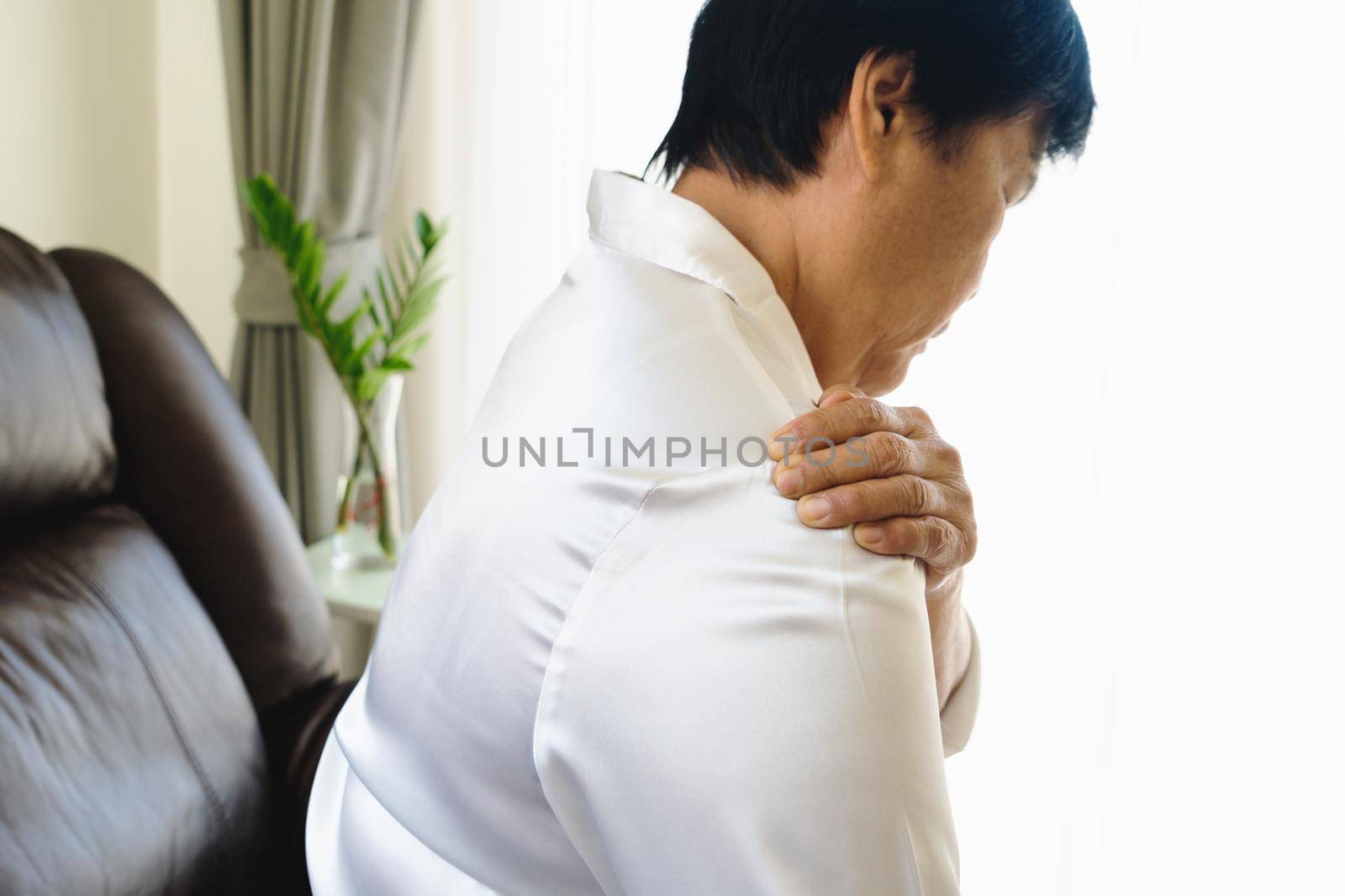 neck and shoulder pain, old woman suffering from neck and shoulder injury, health problem concept