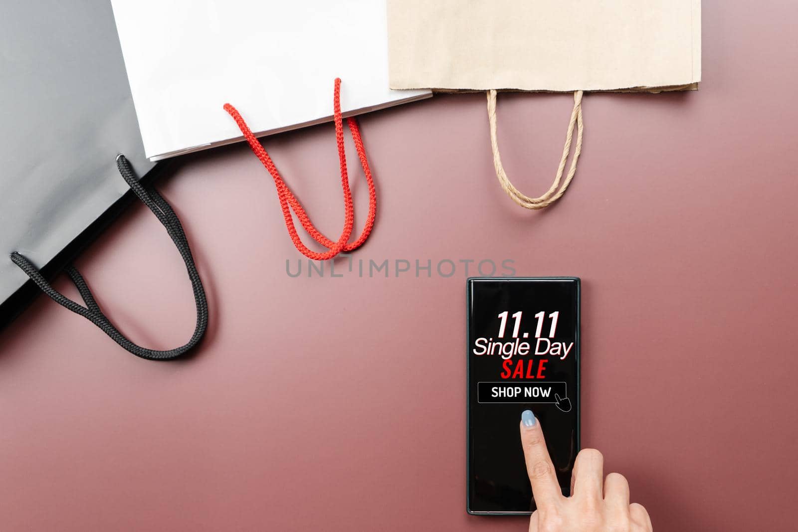 smartphone with shopping bag, China 11.11 single day sale concept