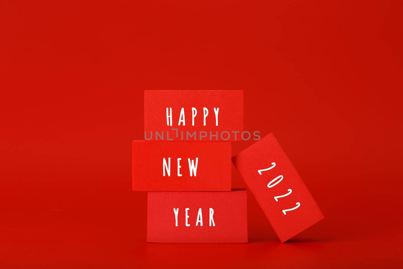 Happy New Year 2022 red minimal concept against red background by Senorina_Irina