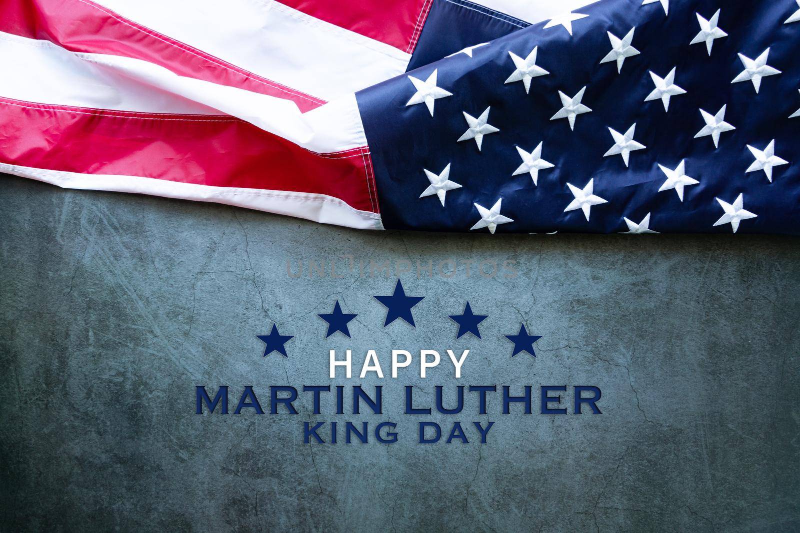 Martin Luther King Day Anniversary - American flag on abstract background by psodaz