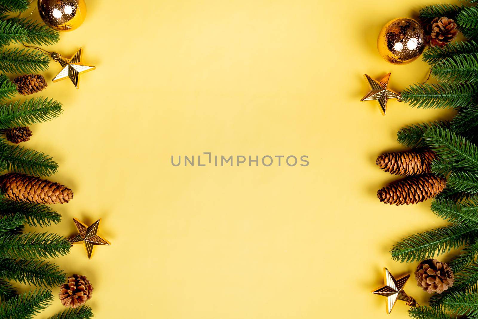 Christmas background, pine tree with xmas decoration on yellow background by psodaz