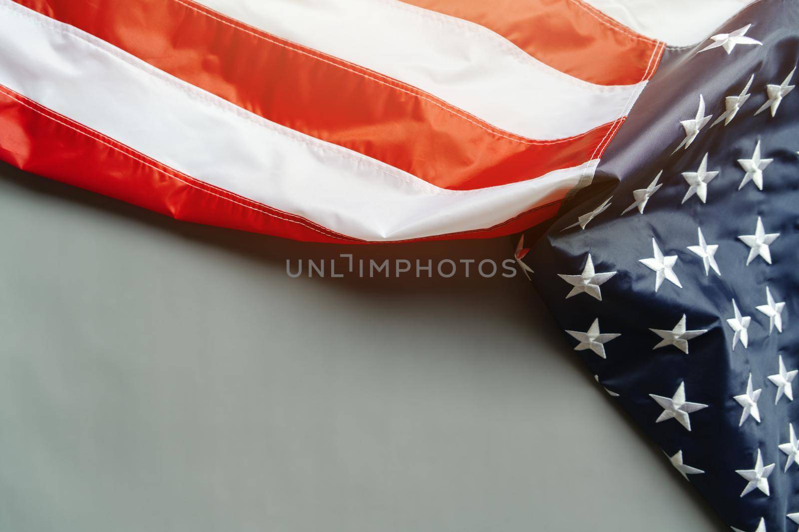 Martin Luther King Day Anniversary - American flag on abstract background by psodaz