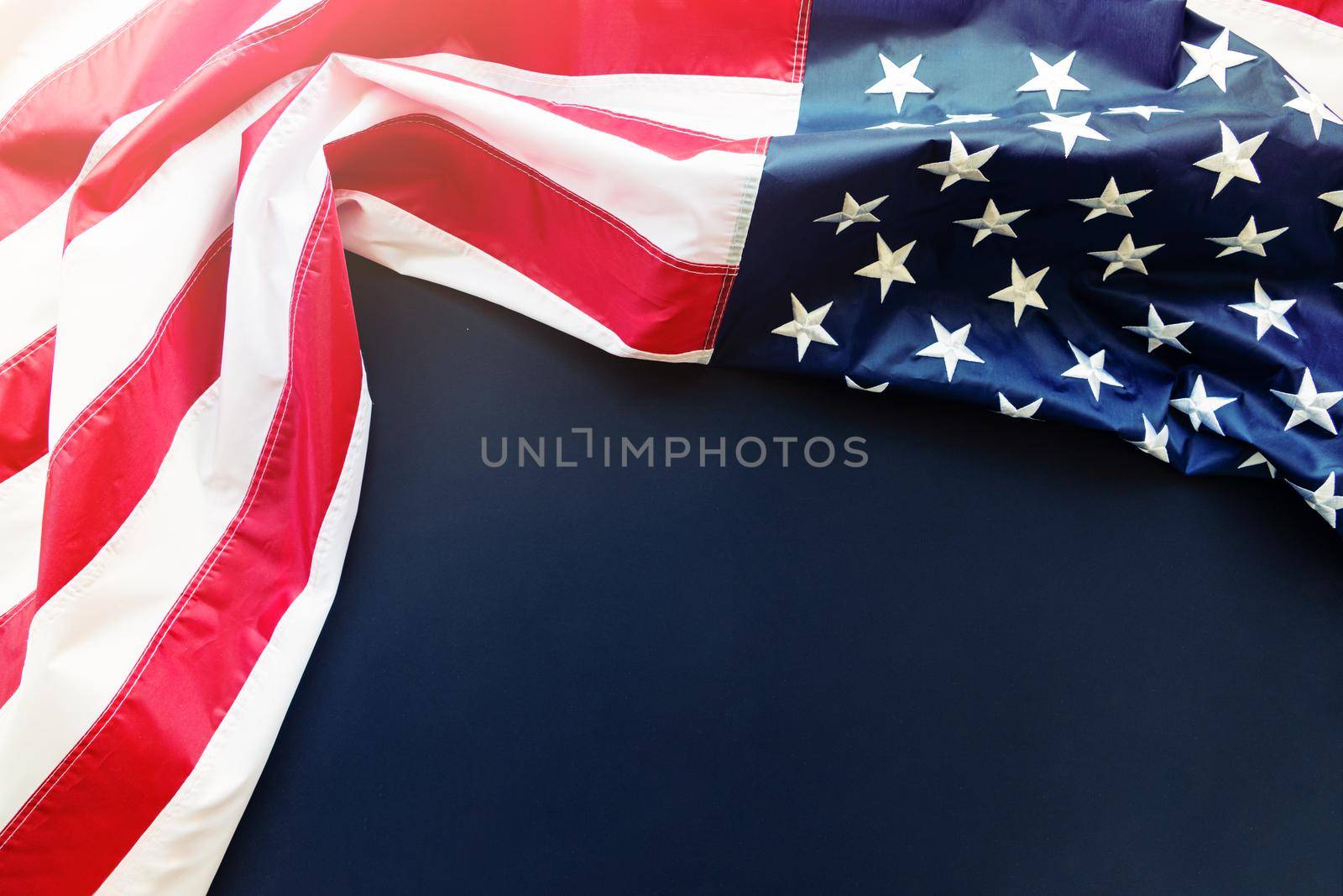 American flag on black background with copy space