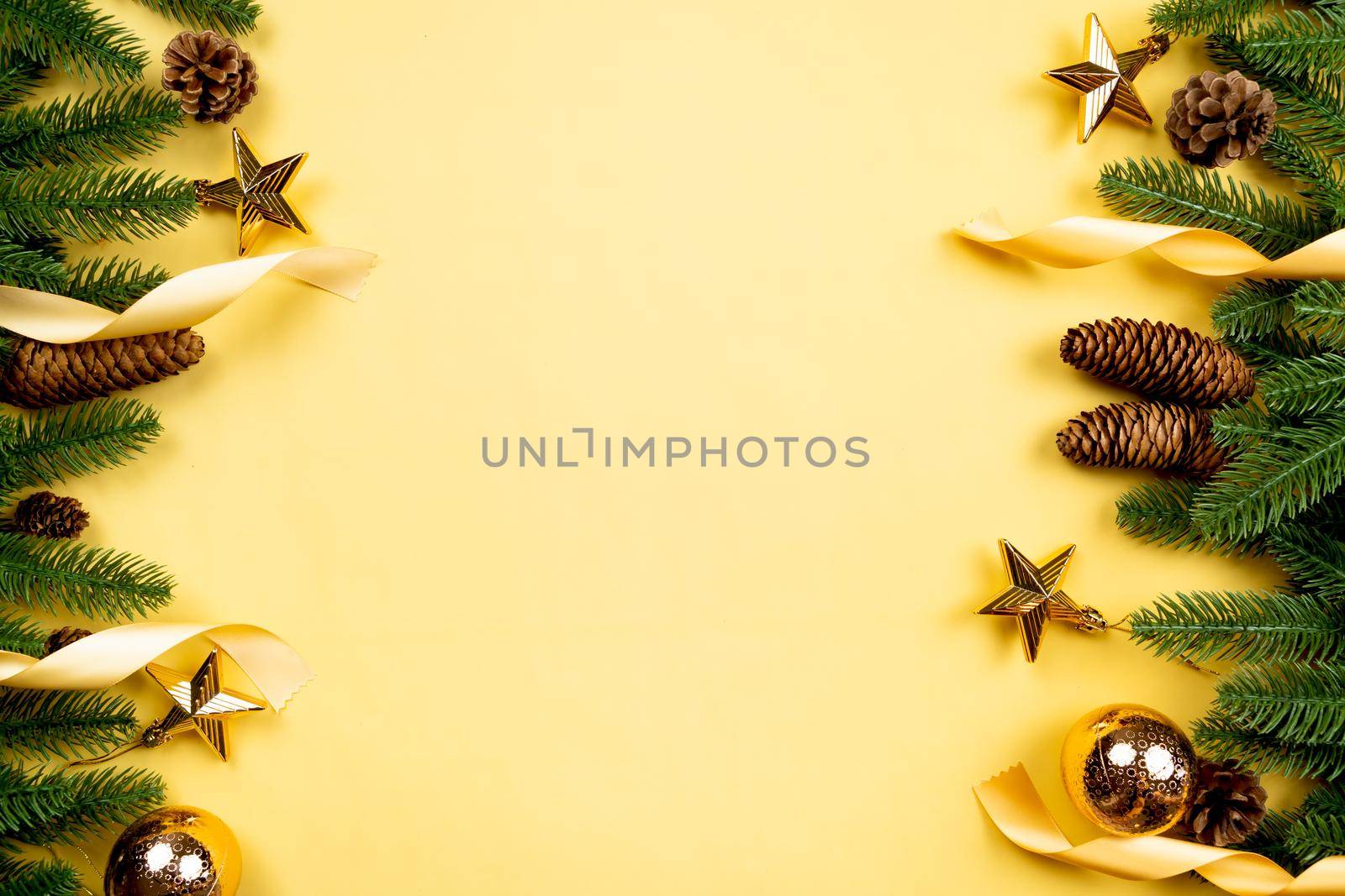 Christmas background, pine tree with xmas decoration on yellow background by psodaz