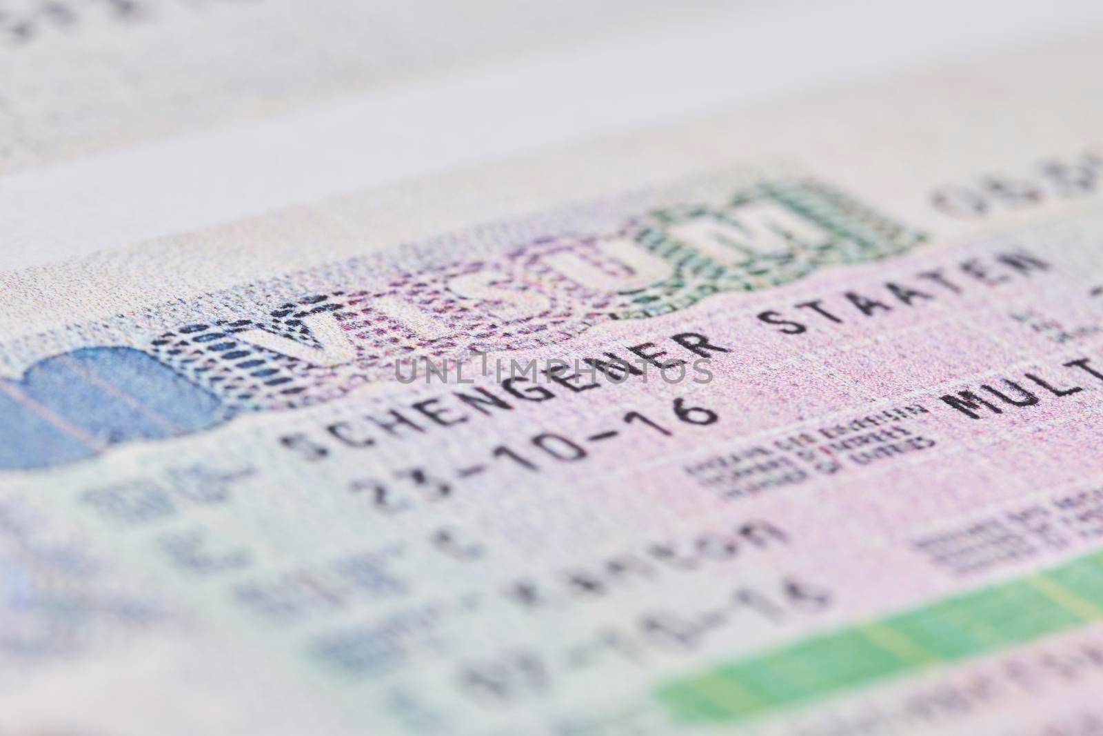 Tashkent, Uzbekistan - 13 August, 2021: Schengen visa in passport. Close-up. Macro shot. Visa stamp in the passport. Schengen visa for tourism and travel in EU
