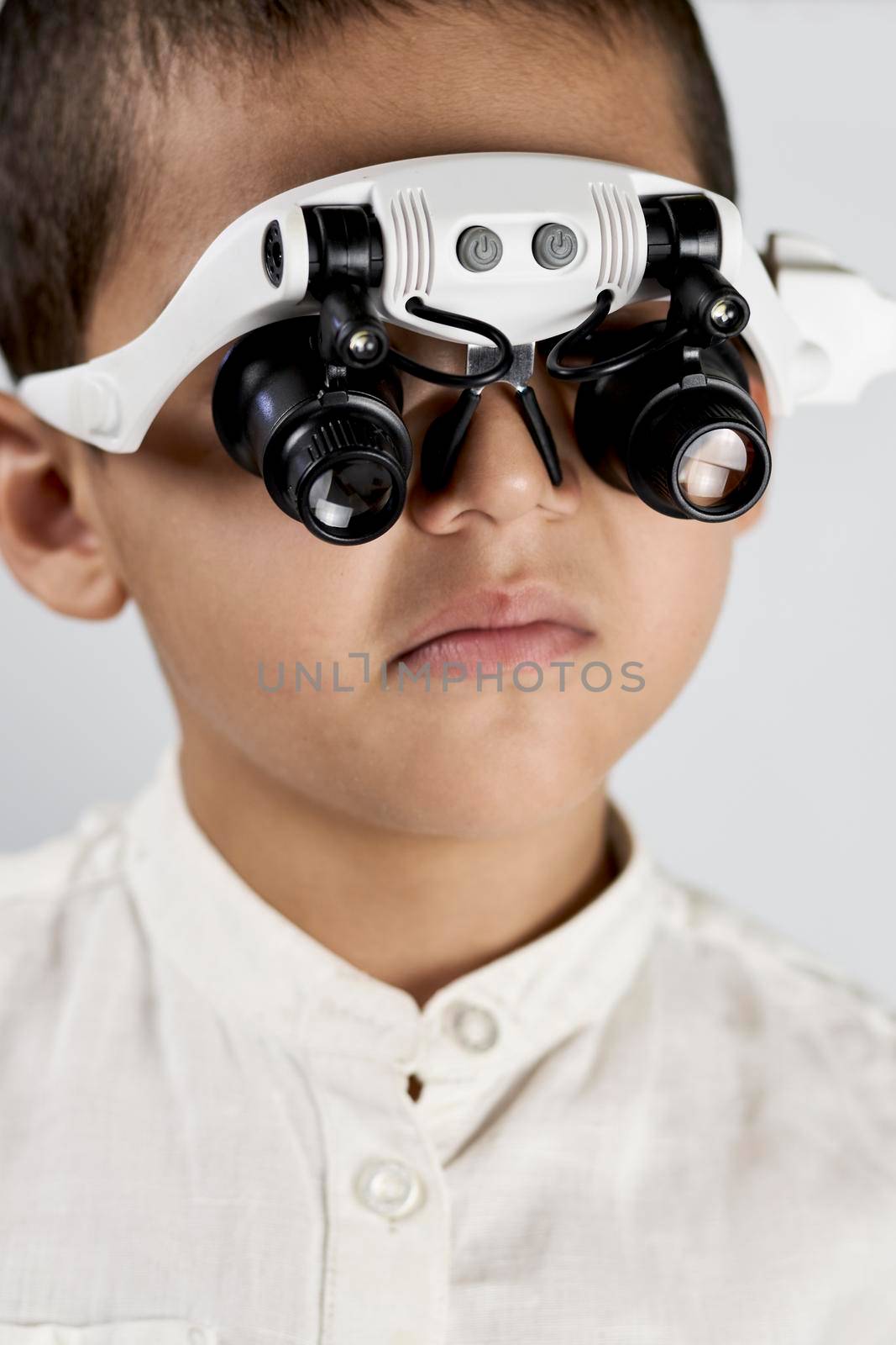A schoolboy in special eyeglasses by golibtolibov