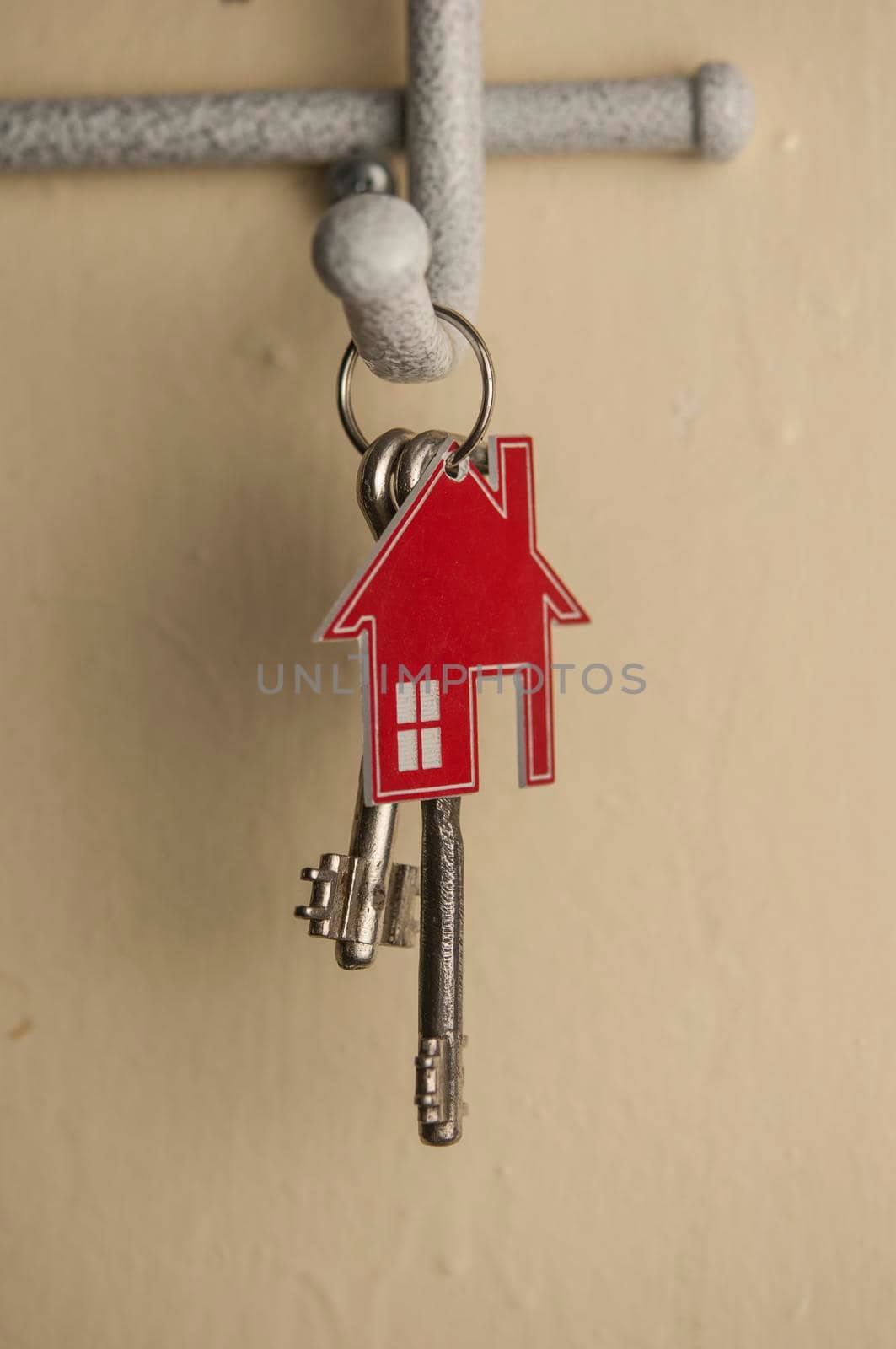 Key holder with keys hanging on the wall by inxti