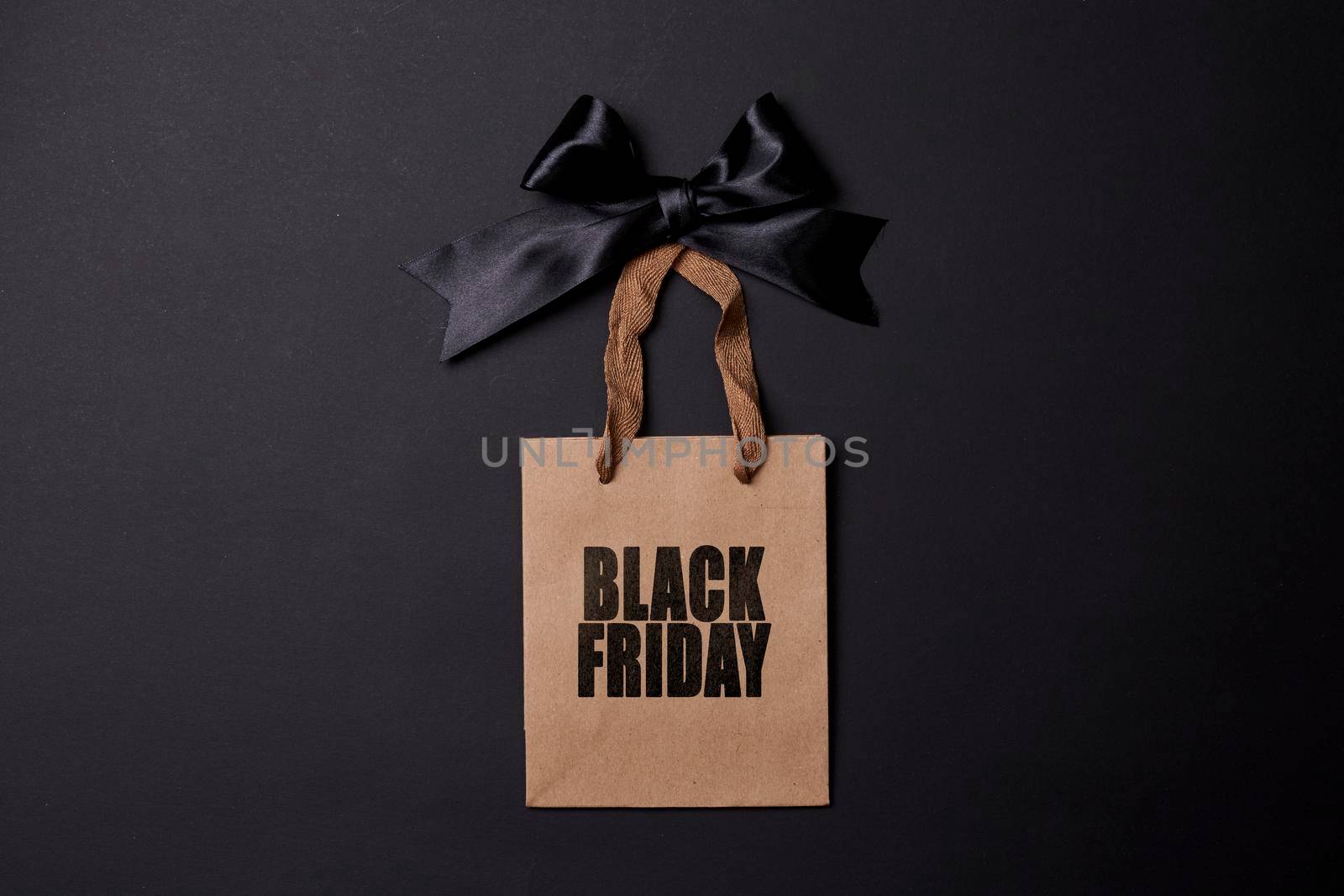 Black friday concept. Shopping bags on black background.