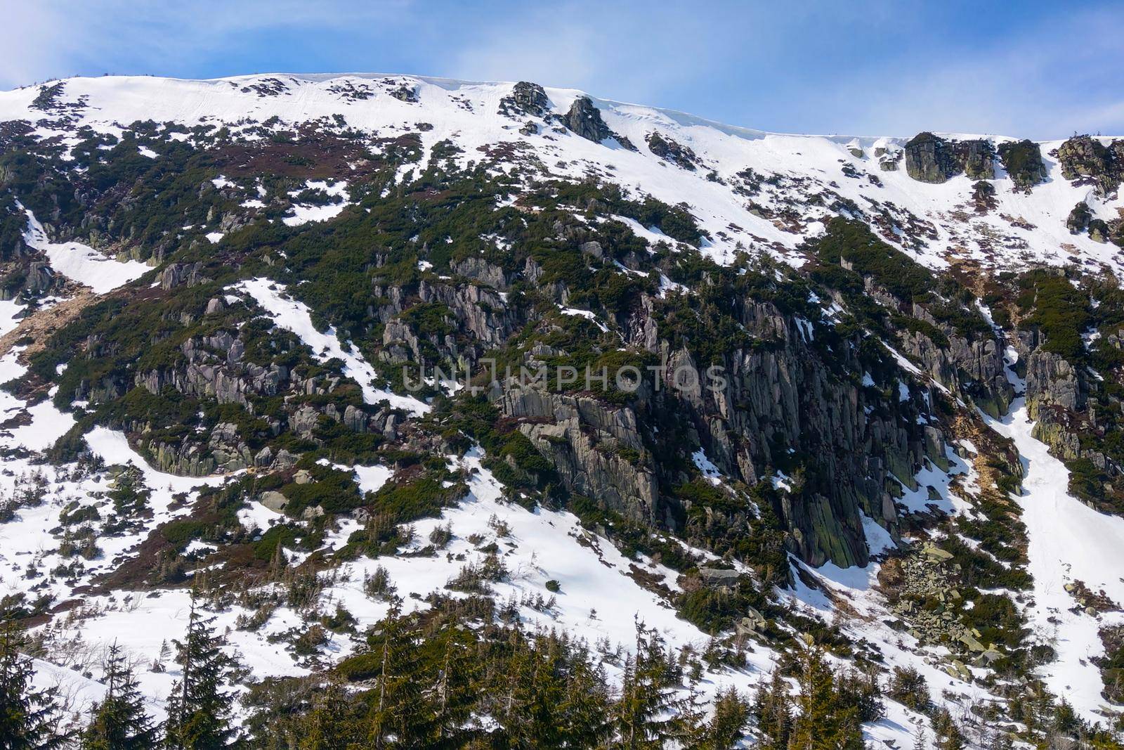 Beautiful view of the mountainside with snow