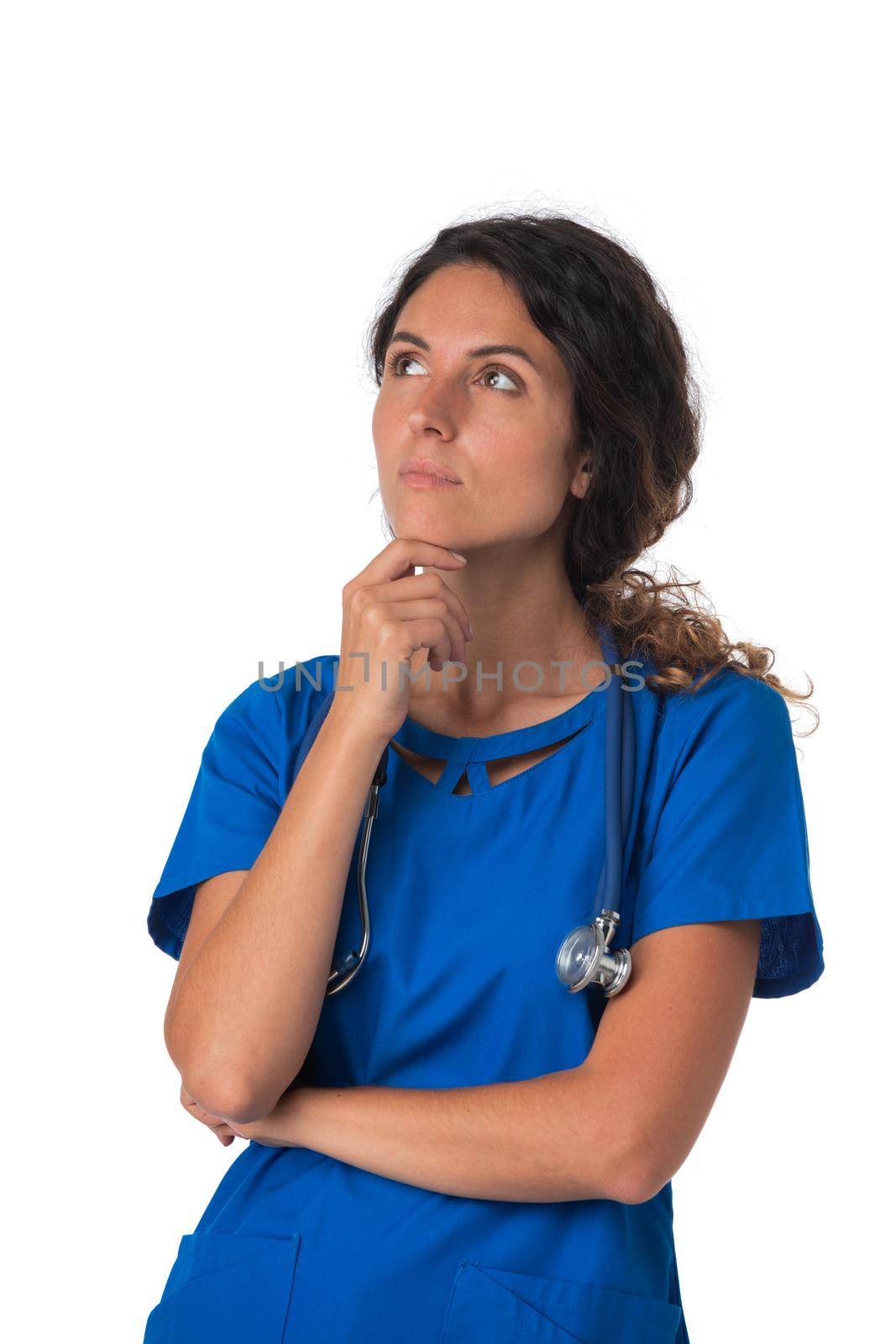 Young doctor surgeon woman over isolated white background with hand on chin thinking about question, pensive expression. Doubt concept.