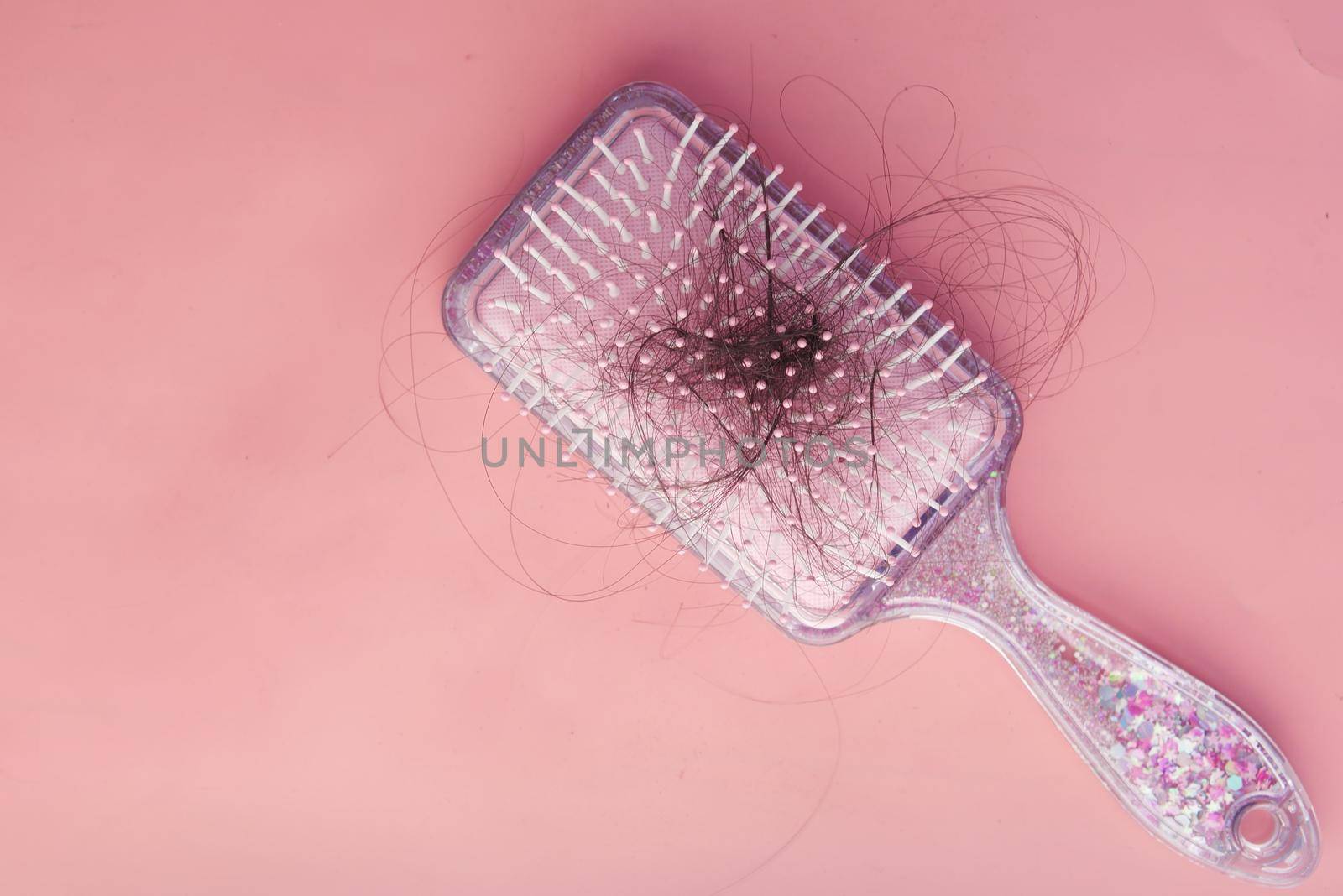 a brush with lost hair