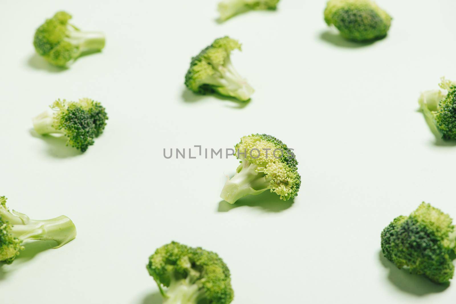 Modern style of the Broccoli isolated on green background. by makidotvn