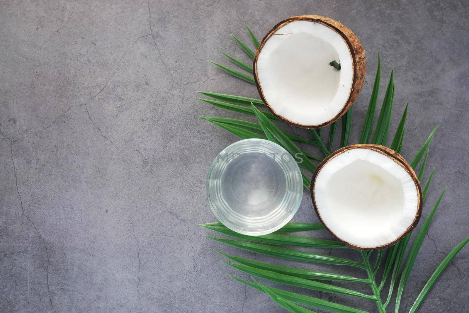 slice of fresh coconut on a table cloth .