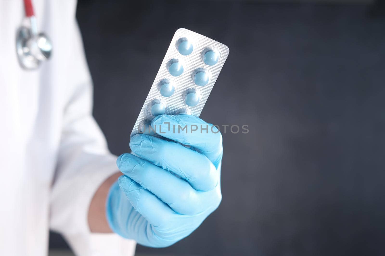 doctor hand holding blister pack close up ,