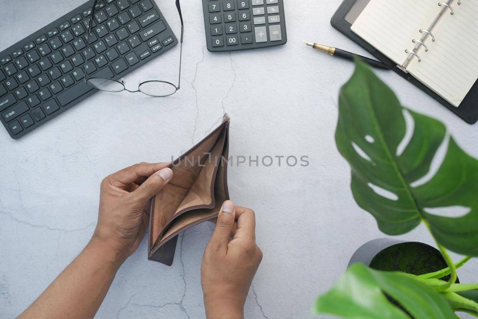 Man hand open an empty wallet with copy space