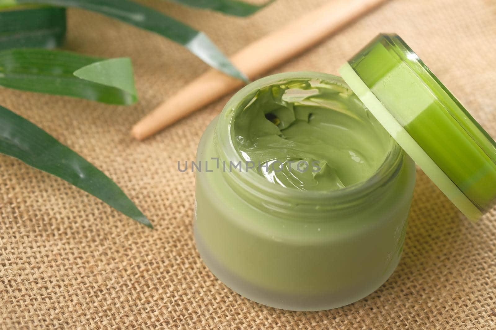 bubble clay mask in container on table ,